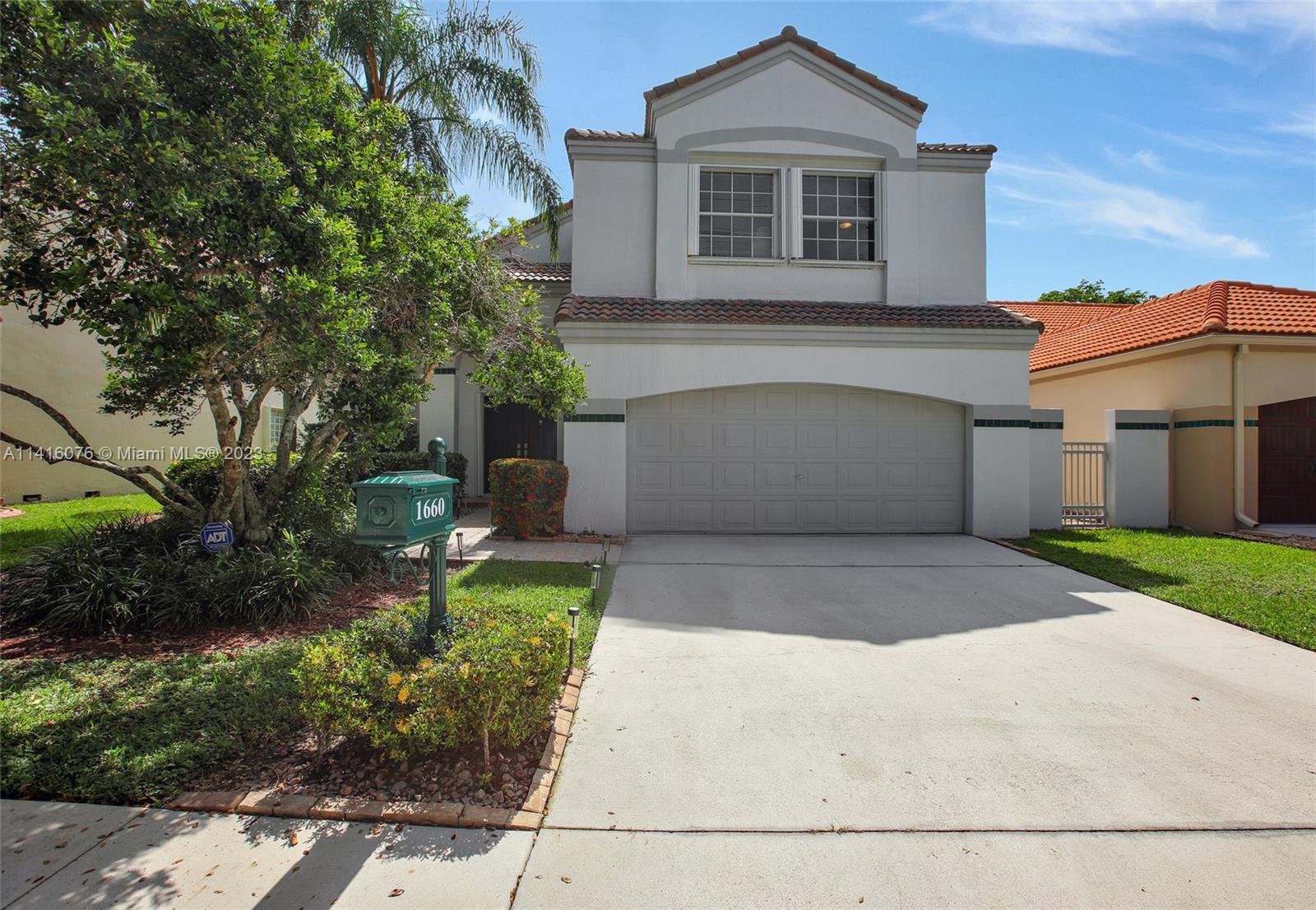 AVAILABLE NOW!! Come see this charming WATERFRONT, 2-story home featuring 3 Bedrooms, and 2.5 Bathrooms with a 2-car GARAGE. Step inside to an inviting open floor plan, an abundance of natural lighting, and vaulted ceilings. Enjoy the recently RENOVATED KITCHEN with stainless steel modern appliances and gorgeous Quartz countertops. Relax in your UPGRADED bathrooms with the primary en-suite bathroom featuring a walk-in shower and a stand-alone tub. Outdoors you will enjoy a screened-in patio with SPECTACULAR wide lake views. Hurricane shutters throughout. Coral Harbour, is an intimate gated community featuring a maintained community pool situated on a large, lovely scenic lake. Located nearby to Weston Town Center and A-RATED schools! MUST SEE!