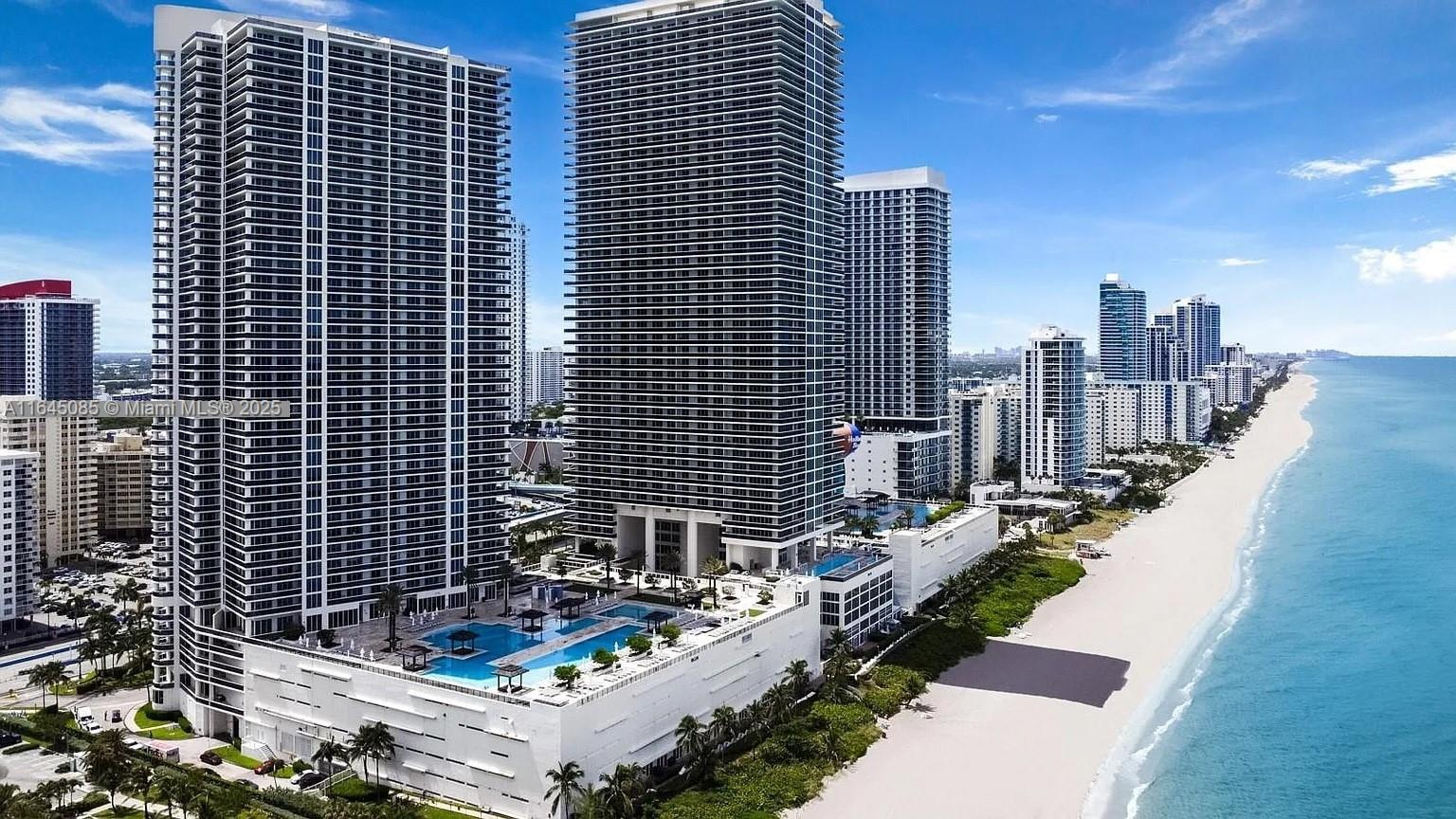 This 1086 square foot condo home has large one bedroom 1 bath + den which can be used as a second bedroom at Beach Club One for rent. On the 38th floor with Intercoastal view, marble floors. Kitchen has granite counter tops and is open to the living room. Both bedrooms have access to the bathroom. Large balcony with breathtaking views. Resort-style amenities: Infinity edge pools, full service spa, fitness center overlooking the ocean, regular exercise classes, restaurants, pool & beach services. Valet and Concierge. Great location just minutes to the beach, water, cable and Wifi is included, One parking spot assigned and one free valet. Washer and Dryer inside the unit.