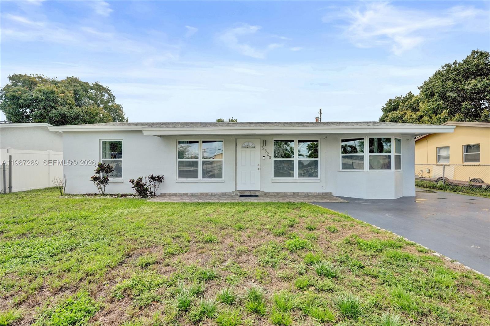 Beautifully renovated 3-bedroom plus DEN home featuring a new roof and electrical panel—truly a rare find. This solid concrete block property offers a spacious layout with a living room, family room, and formal dining area. The updated kitchen boasts granite countertops, stainless steel appliances, and modern finishes throughout, including laminate flooring.

Enjoy outdoor living on a large lot with plenty of space to add a pool, a fully fenced backyard with privacy gate, and a driveway that easily accommodates three vehicles. Additional highlights include impact windows and doors, and ample parking space.

Home is being sold as-is. All information deemed reliable but not guaranteed—buyer to conduct due diligence.