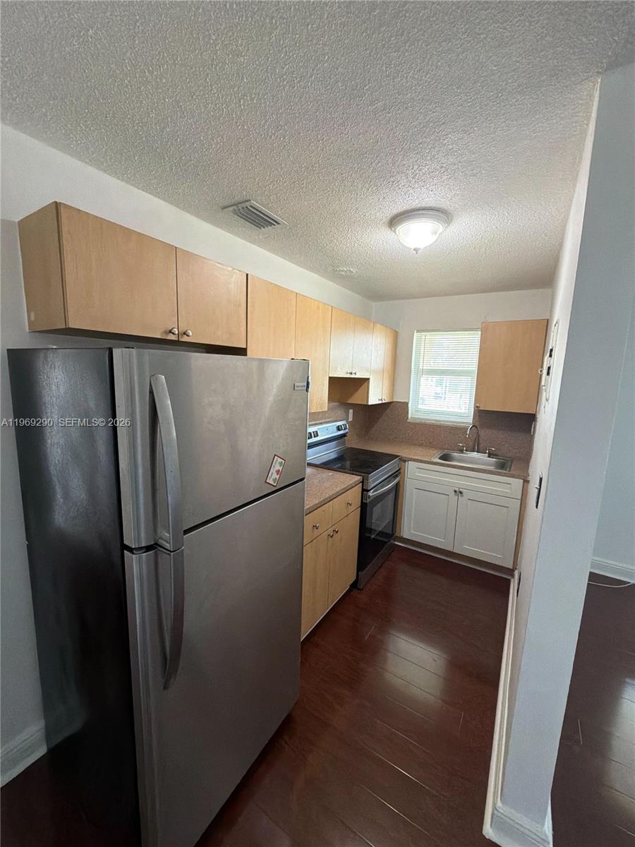 Charming 2 Bed 1 Bath Home for Rent in the Heart of Miami

Discover comfort and convenience in this charming 2-bedroom, 1-bath home located in a vibrant and centrally located Miami neighborhood. The property features spacious bedrooms, a bright living area, tile flooring throughout, and a well-maintained kitchen with plenty of cabinet space. Enjoy the convenience of on-site parking and easy access to public transportation, major highways, schools, shops, and parks.

Rental Requirements:
- Monthly income must be at least 3 times the rent
- Credit score of 650 or higher
- Move-in cost: First month’s rent + 1 month security deposit
- Application fee: $100

Located near Little Havana, Marlins Park, and the Miami River, this home is just minutes from Downtown Miami, Brickell, and major expressways like I-95 and 836.

For more information or to schedule a showing, contact us today!