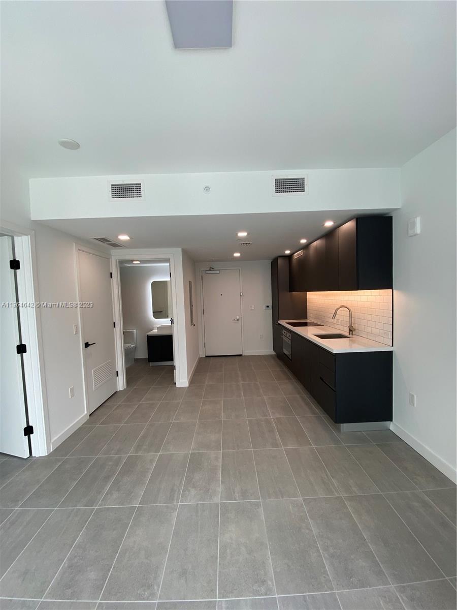 227 NE 2ND STREET CONDO - Residential Lease