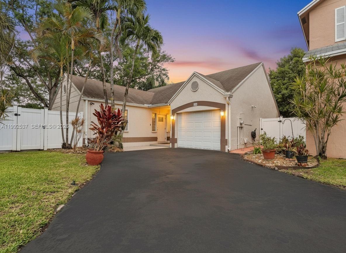 Welcome to Casa Centralis! Rarely available one-story corner residence in the gated community of Charlestone in the Pines, ideally situated on a quiet cul-de-sac in the heart of Pembroke Pines. Proudly owned and meticulously maintained by its original owner, this 3-Bed, 2-Bath home reflects true pride of ownership throughout, offering 1,408 SF of bright and functional living space. The interior showcases new LVT flooring throughout, an updated open kitchen with tall cabinetry and ample storage, a newer AC, and renovated bathrooms complemented by modern finishes. Enjoy a private corner location in front of the community pool, within a gated, safe community. LOW HOA! Conveniently located near top shopping centers, the Pembroke Lakes Mall, The Shops at Pembroke Gardens, as well as the new City Center, major highways, and just minutes from I-75 for an easy commute. An exceptional opportunity to own a move-in ready home in one of Pembroke Pines’ most central and desirable locations!