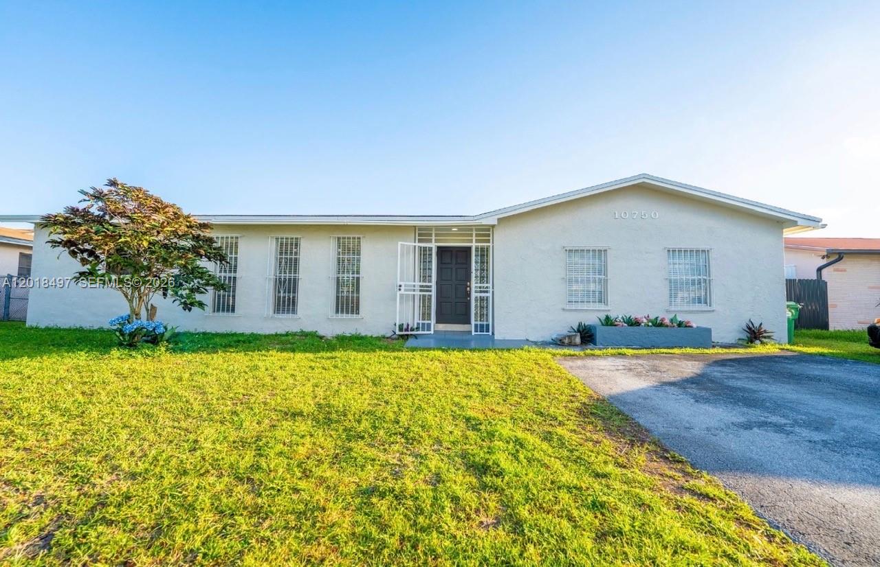 Excellent investment opportunity at 10750 SW 173 St, Miami, FL. This property not only offers comfort and a prime location, but also great income-producing potential.
The main home features spacious living areas filled with natural light, a functional kitchen, comfortable bedrooms, and a large backyard perfect for family gatherings and outdoor entertainment.
One of the standout features of this property is the two separate efficiencies located on each side of the home, offering the perfect opportunity to generate additional monthly income, accommodate extended family, or create private guest spaces.
Located in a quiet and highly desirable residential area, close to schools, supermarkets, restaurants, parks, and with easy access to the Florida Turnpike and major Miami-Dade roadways.
Ideal for buyers seeking a primary residence with excellent investment and cash-flow potential. Don’t miss this incredible opportunity!