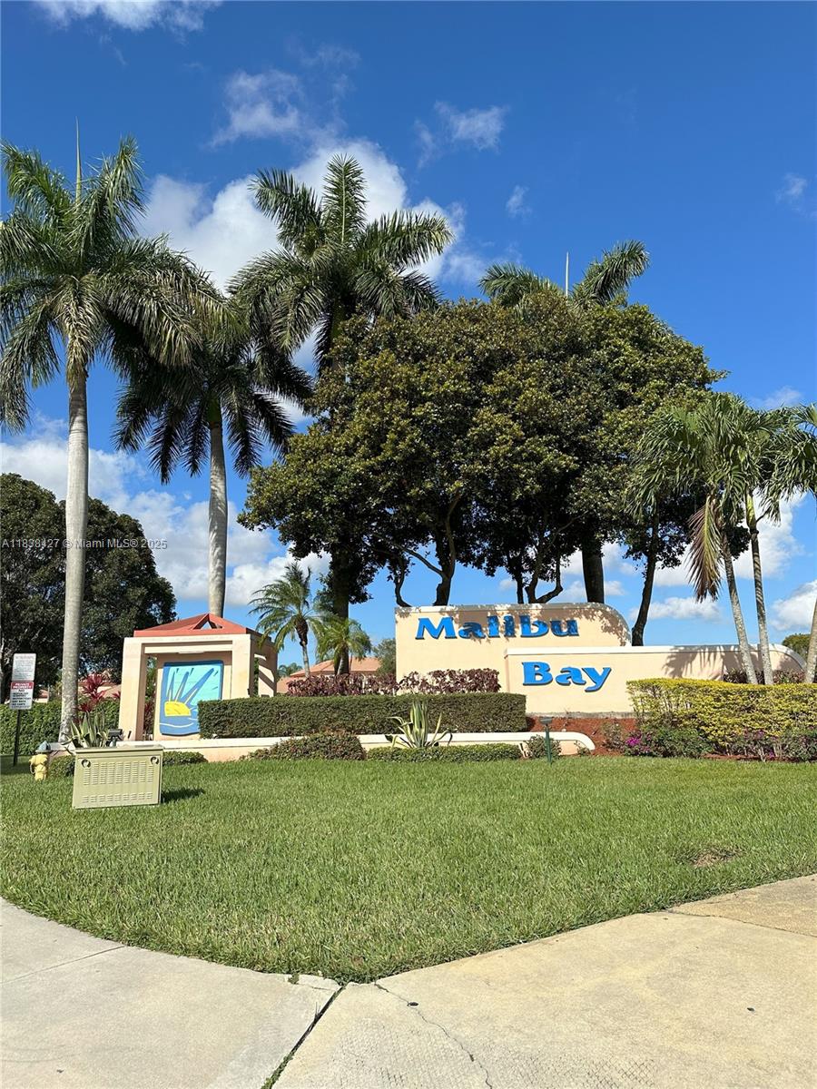 Welcome to this beautifully maintained 3-bedroom, 2-bath townhome  with 2 parking spaces, in the highly sought-after Malibu Bay community of Pembroke Pines! Perfectly located with easy access to I-75 and Okeechobee Road, commuting is a breeze whether you’re headed to Miami, Fort Lauderdale, or anywhere in between. Enjoy the convenience of being just minutes away from shopping centers, restaurants, parks, and many options. Located in a top-rated school district, ideal for families and professionals. The gated community offers resort-style amenities including a pool, clubhouse, fitness center, tennis court and playgrounds—making it a desirable place to live. With spacious living areas, this townhome is a nice option in today’s rental market. Don’t miss the opportunity!