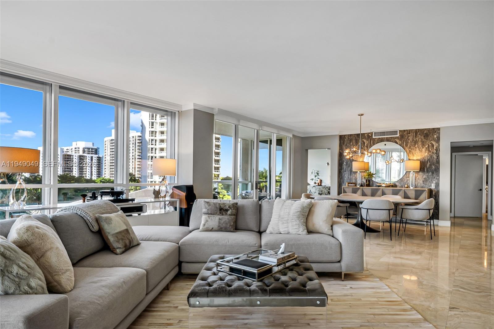 Welcome to this beautifully renovated 2 bedrooms plus den/office, 2 and a half bathroom, corner unit with large balconies at The Point Atlantic II, Aventura, FL. Featuring a spacious living room and dining room, newly updated window treatments and high ceilings. This home has a modernized kitchen and bathrooms along with a brand-new air-conditioning system. Residents enjoy the exclusive amenities of a private club, including a fitness center, spa, beauty salon, 3 swimming pools, restaurant and full schedule of classes. Situated in a gated community with 24 hours security and concierge. The unit has 2 parking spaces and one storage unit. Discover the perfect blend of luxury, comfort and convenience at The Point. Conveniently close and walking distance to Aventura Mall, restaurants, shops and houses of worship.
