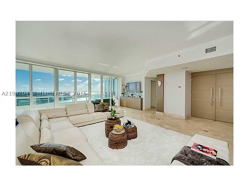 Spectacular panoramic views await at this gorgeous, floor-through 3 bedroom, 3.5 bathroom + den waterfront sky-home. Custom double-doors open from your private elevator foyer directly into the wide open living areas where the eye is immediately drawn outs ide to wide bay views & dynamic Miami skyline. Top-of-the-line eat-in kitchen w/ocean & beach views. All en-suite bedrooms. Two huge balconies. Lux building w/full amenities & access to private club, LaPiaggia. Prime South of Fifth location. Call today.