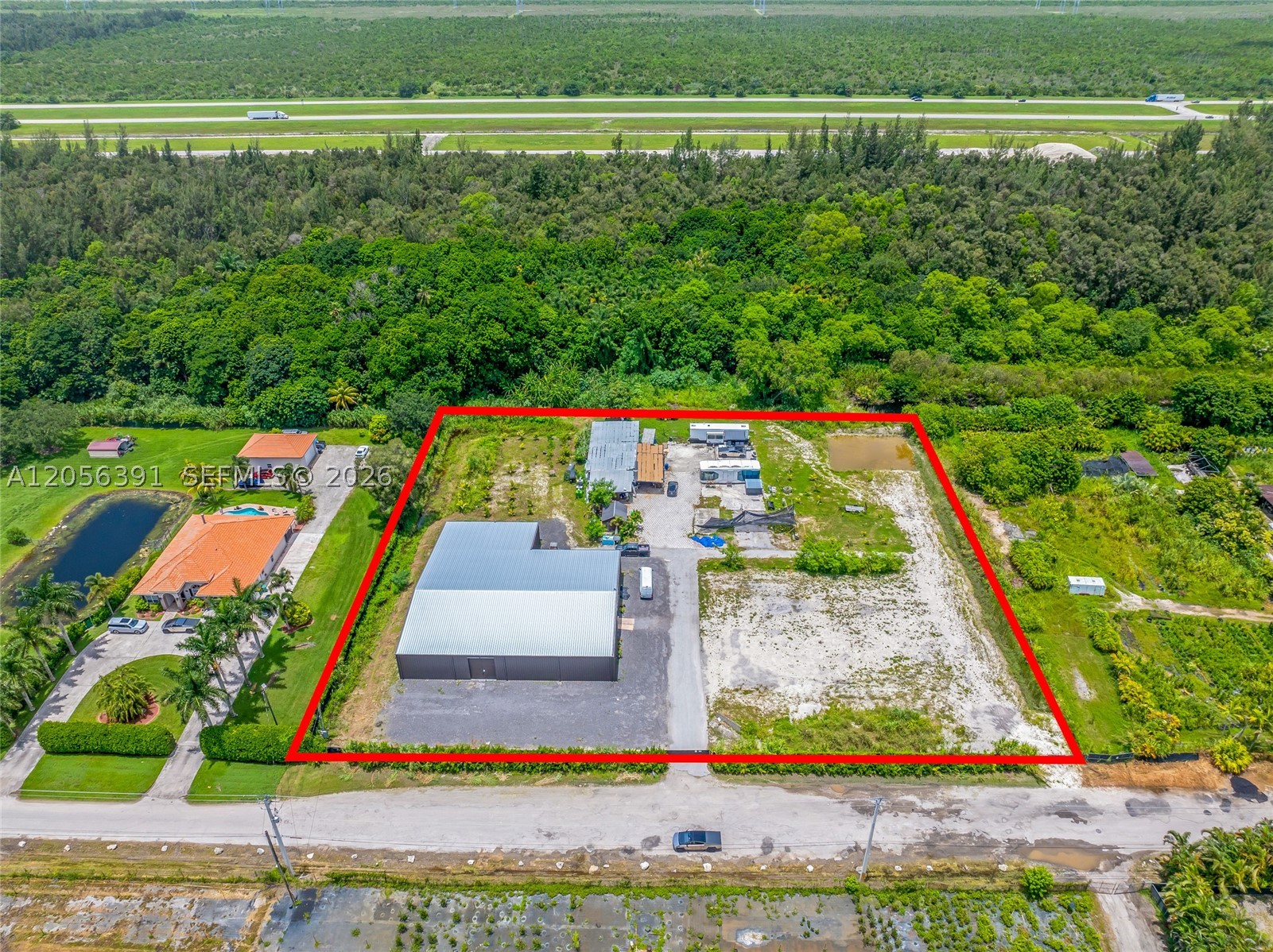 EVERGLADES LAND CO - Land