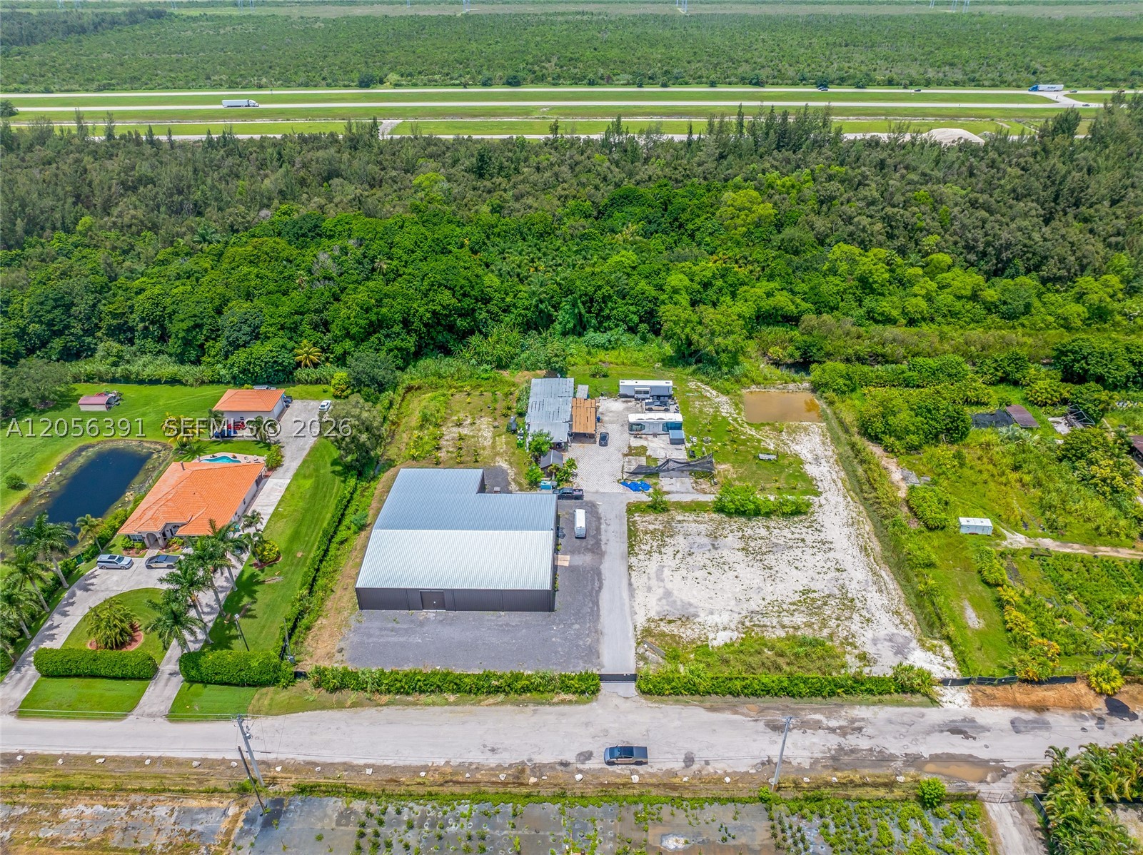 EVERGLADES LAND CO - Land