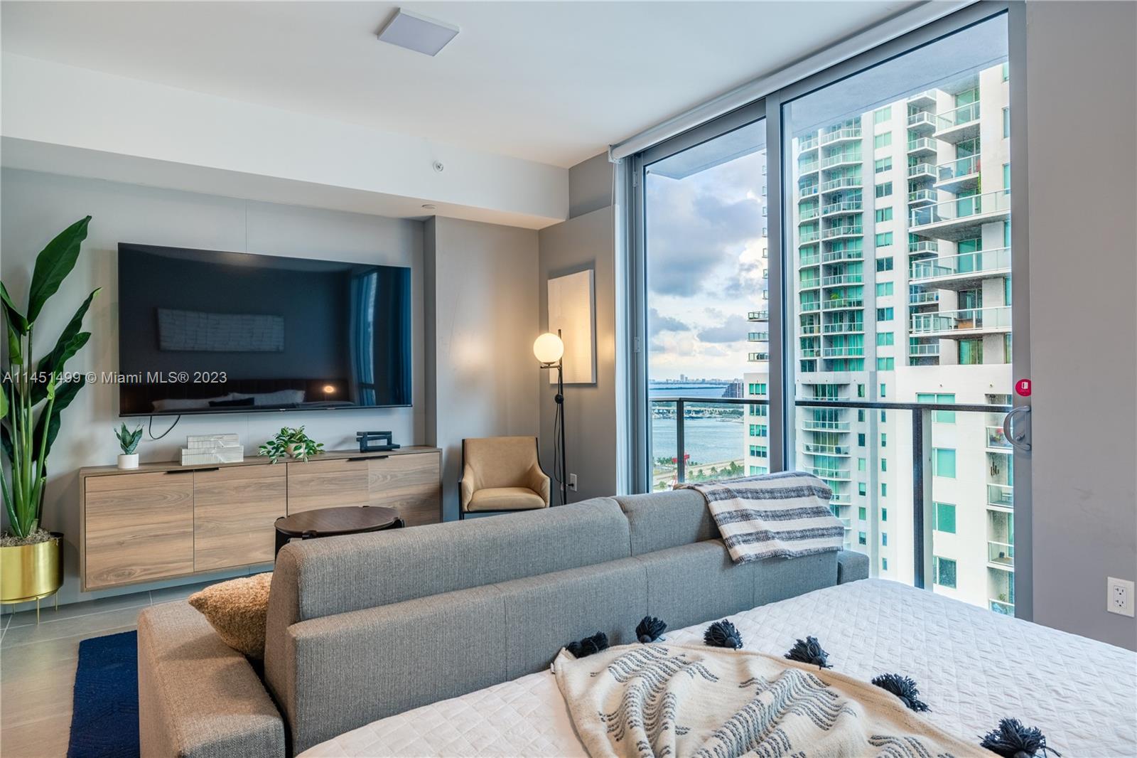 Located in the heart of Downtown Miami, minutes from Brightline Station & FTX Arena, walking distance to restaurants/shops & adjacent to neighborhoods like Wynwood & Brickell, this amazing Studio+1 bath is fully furnished with premium furniture, turnkey ready & offers washer/dryer & a secured storage unit. Sleeps up to 4 (king bed + sofa bed w/ hospitality quality mattress). Hotel-like amenities, to include owners' lounge, Hi-Tech gym, pool/jacuzzi, pet spa, restaurant, coffee bar, resident's lobby, 24/7 front desk & valet parking. HOA includes: Building maintenance, water/sewer, internet/TV dish box. Designed for short term rentals & located in the globally recognized Yotel brand, you have the flexibility to manage your unit w/ any operator of your choice. Great for investors.