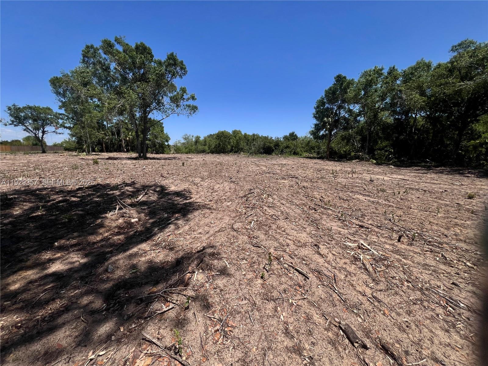 Here’s a fantastic opportunity to grab a 2.53-acre piece of land in a lovely and central location in Lehigh Acres! This land is already cleared and just waiting for your creative project. Plus, it backs up to the beautiful Hans Marsh Preserve, giving you lots of privacy and a tranquil atmosphere. You'll be close to schools and just a hop away from Sunshine Blvd, making it super easy to get to Fort Myers. Don't miss out on this wonderful chance to make this gem of a property your own!