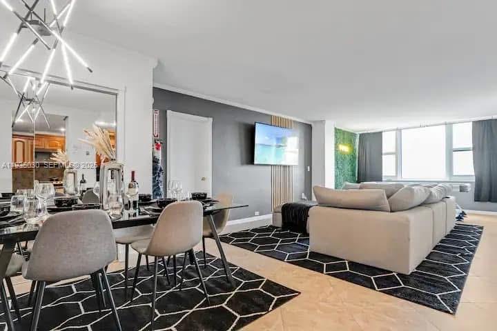 Great investment opportunity. AIRBNB or VRBO welcome! No rental restrictions! Updated and Furnished 2/2 Unit, Can Be Rented As Often As Owner Wishes Per Condo Docs., Hotel Has Tiki Bar, restaurant, Valet Parking, Heated Ocean Front Pool, Hair Salon, Gift Shop, gym,  Coffee Shop, Lounge, Corporate Ownership Allowed, This Unit can be used as 2 bedroom unit or 1 bedroom +hotel unit- can be rented as 2 separate units.