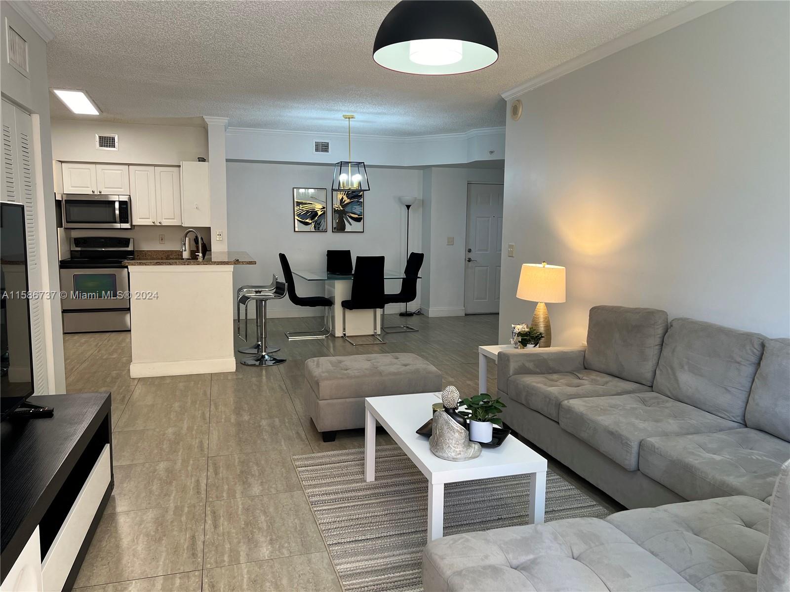 Wonderful and comfortably Furnished 2/2 Master Bedroom split floor plan. Very private, corner unit. Open dining and living room, tiled flooring throughout for easy cleaning. Washer and Dryer inside the unit. Unit comes Fully Furnished with a King size bed in the Master & two twin beds in the guest. Enjoy all of the fantastic amenities Porto Bellagio has to offer. Heated swimming pool, Lap Pool, Jacuzzi's,24 HR Fitness Center, Gorgeous clubhouse overlooking the Intracoastal, Children's Rm, Bus Center, Conference Room, Pool Table, Yoga Rm. Walking distance to the Beach, Restaurants, Cafes & more. Condo comes with one assigned and covered paring space. Easy to Show. Call Today!