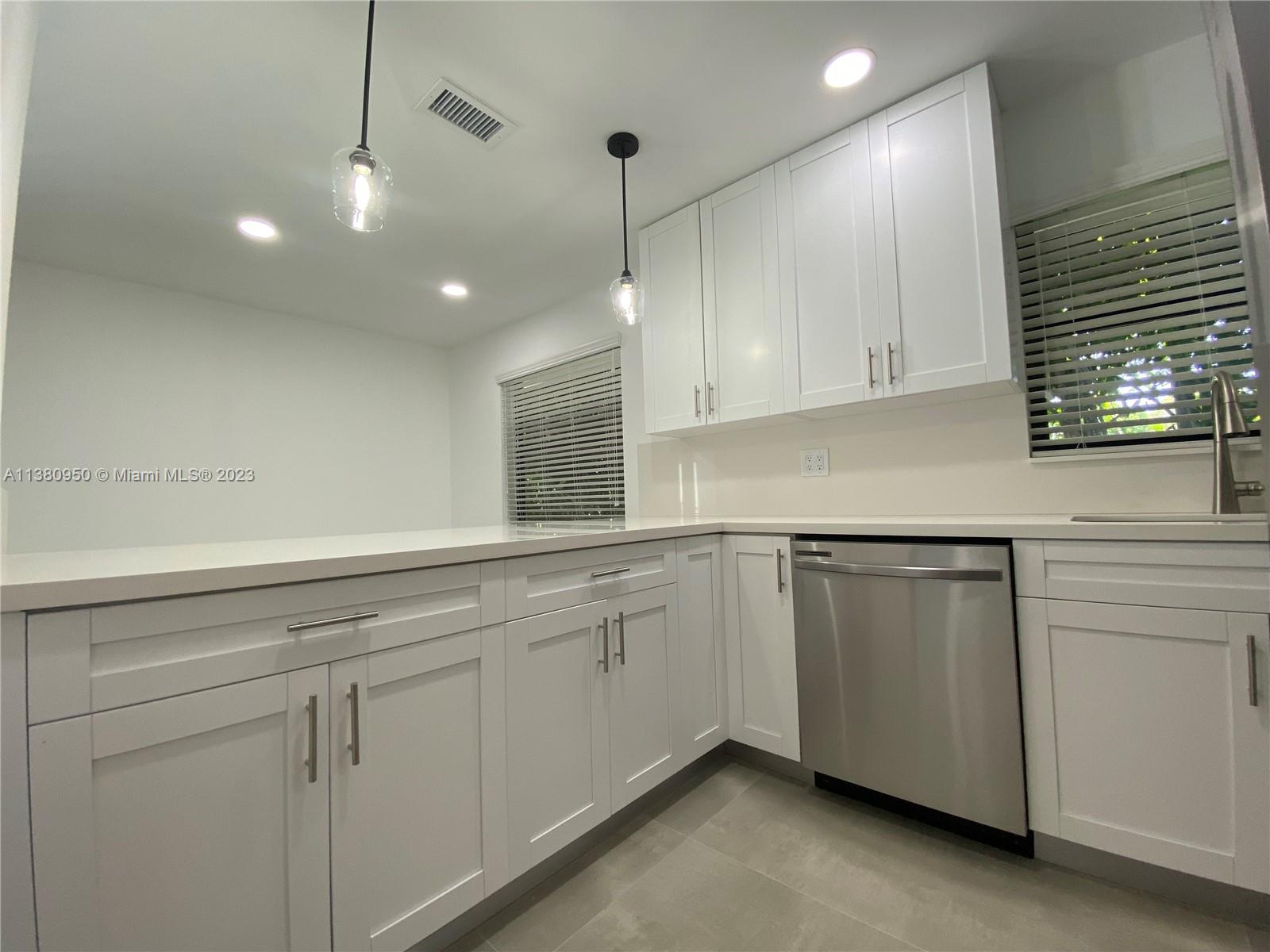 Look no further...you have found the place you will call home in this completely renovated first floor duplex!  This 3 bedrooms/2 bath unit has the feel of a single-family home featuring tile floors throughout, kitchen with stainless steel appliances, master bathroom with a shower and bidet, washer and dryer in the unit, impact windows, large backyard and two parking spaces. Located in a coveted school area and within walking distance to Publix and all the restaurants and shops Miracle Mile and Coral Gables has to offer.  See it ... love it ... sign a lease!  No pets allowed.