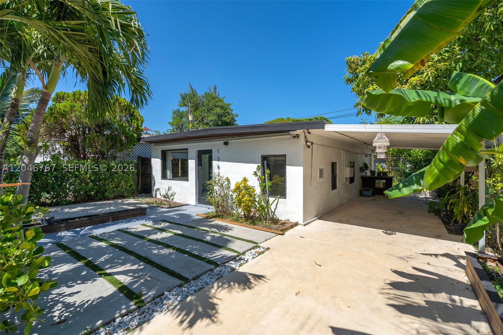 Ready to move in 2 bed, 1 bath single-family CONCRETE BLOCK home with no HOA! A nature immersed home that embodies Miami's tranquil living. Fully protected with impact windows all around; a new owner can enjoy a worry free place -- tankless water heater, new mini-split unit and upgraded bathroom. Centrally located east of Biscayne Blvd, close to parks, shopping centers, malls and a few miles from the ocean. Nearby highly rated schools and the Florida university Campus. FHA approved for first time home buyer.