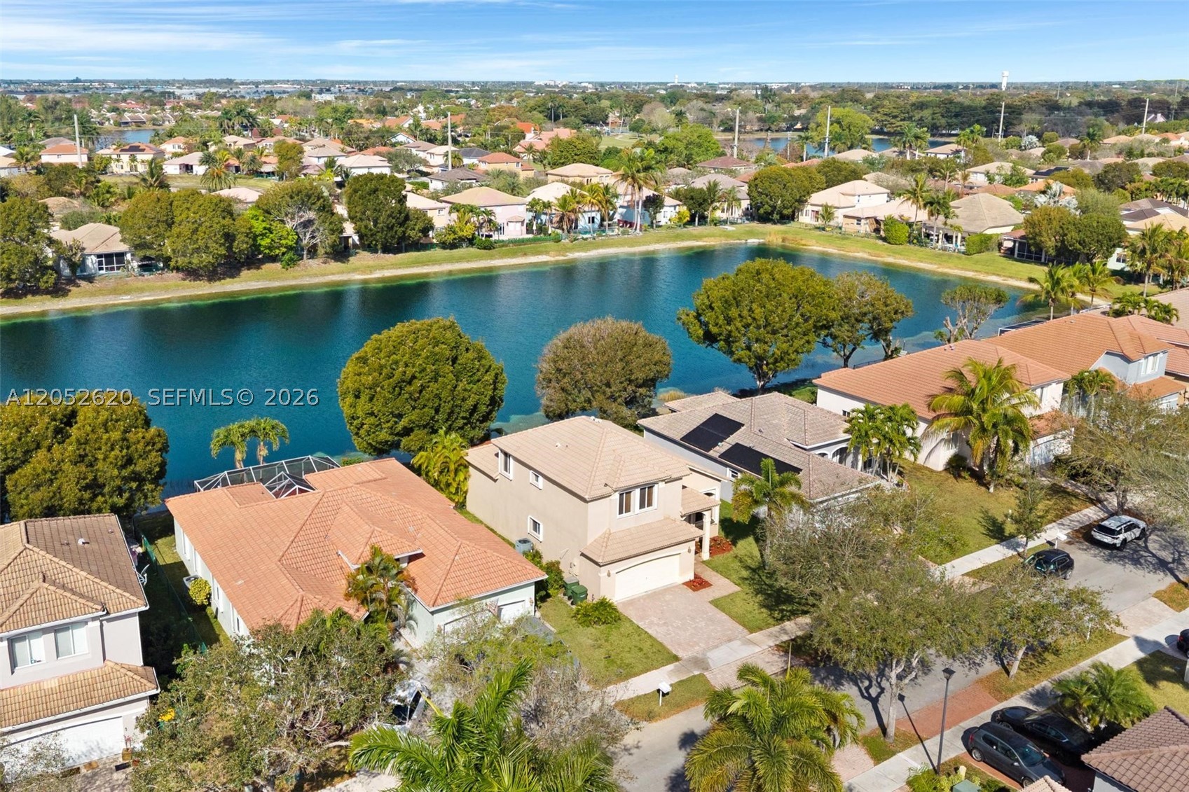 Welcome to this beautiful 4-bedroom, 2.5-bath home offering comfort, style, and breathtaking lake views. Featuring laminate flooring throughout, this spacious home boasts an open and functional layout with a versatile loft, perfect for a home office, playroom, or additional living space.

The heart of the home is the bright kitchen and family room, where stunning lake views create the perfect backdrop for everyday living and entertaining. Wake up each morning to peaceful water views from the spacious primary bedroom, making every day feel like a retreat.

Additional features include a two-car garage, an extended driveway with ample parking, and plenty of natural light throughout the home.

Located in a beautiful gated community, residents enjoy exceptional amenities, including an amazing clubhouse with resort-style features designed for relaxation and recreation. Whether you're enjoying the tranquil lake views, entertaining guests, or taking advantage of the community amenities, this home offers the perfect blend of comfort, convenience, and lifestyle.

Don't miss this opportunity to own a home where the spectacular lake views truly steal the show!