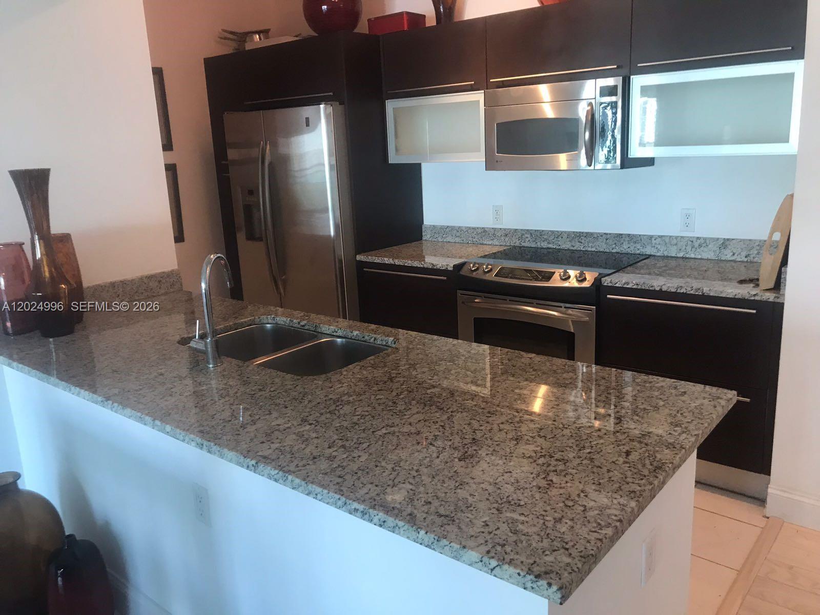 THE PLAZA 851 BRICKELL CO - Residential Lease