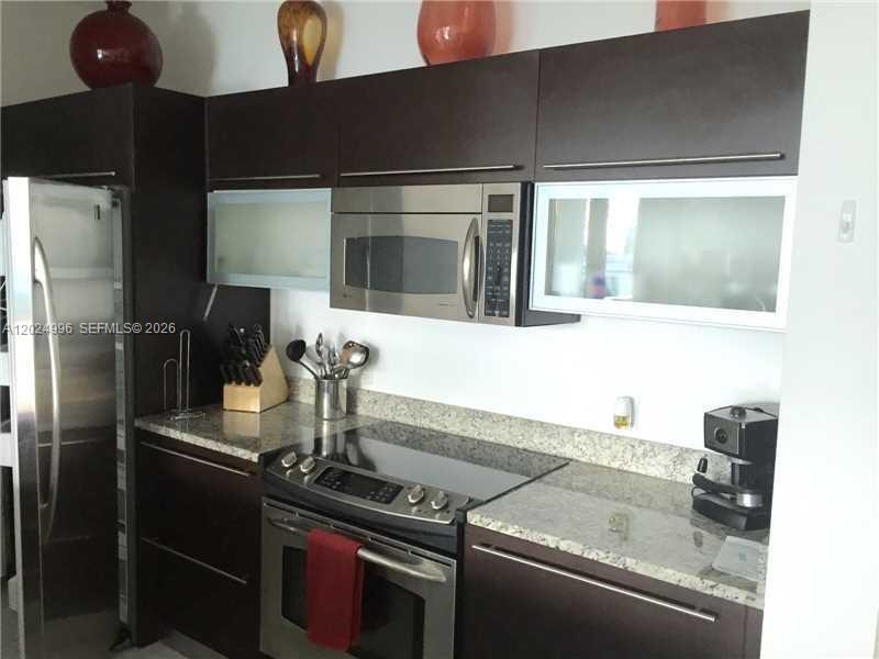 THE PLAZA 851 BRICKELL CO - Residential Lease