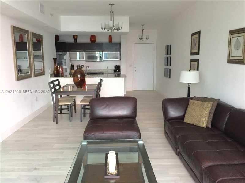 THE PLAZA 851 BRICKELL CO - Residential Lease