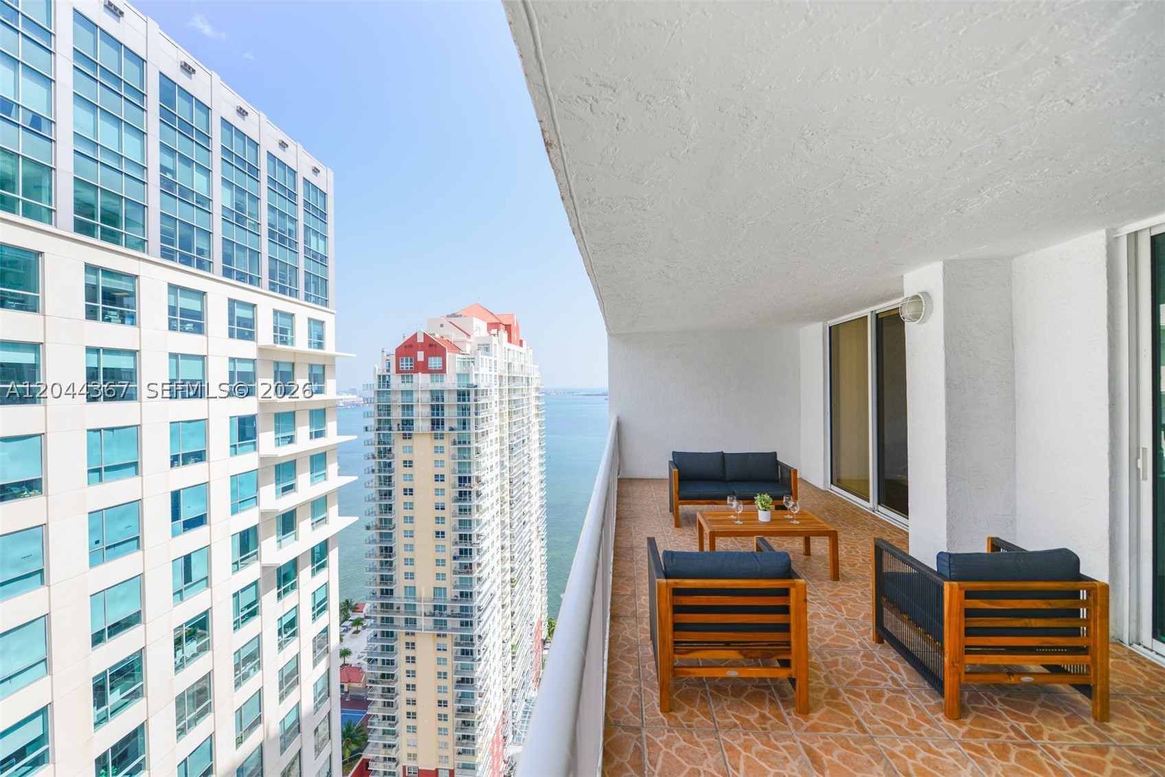 Live it, rent it, or do both in one of Brickell’s most desirable and high-demand locations. This beautifully furnished 1BR/1BA on the 36th floor at The Club at Brickell Bay offers bay and skyline views, an oversized balcony, and a bright, comfortable layout that works equally well as a personal retreat or income-producing property. Start the day with coffee overlooking the water, then unwind by the sparkling pools, hot tub, sauna, or fitness center. Valet, concierge, 24/7 security, washer and dryer inside the unit, and 1 assigned garage space add to the appeal for both owners and guests. Just steps from Brickell City Centre, Mary Brickell Village, top dining, cafés, nightlife, and Metromover, this is a rare opportunity to own a furnished, move-in ready condo in a building that allows daily rentals, offering strong Airbnb potential in one of Miami’s most walkable and desirable neighborhoods.