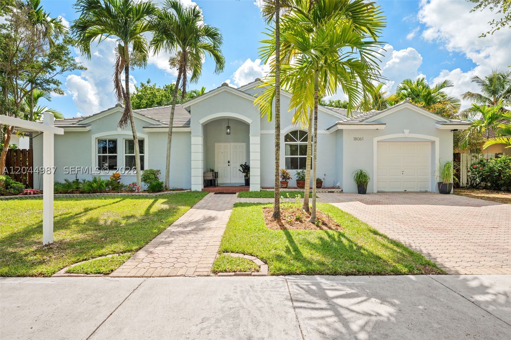 Enchanting Nature Lover's Oasis
Welcome to this beautifully spacious and elegantly simple 3-bedroom, 2-bathroom single-family home. Step inside to find a bright, welcoming interior with a comfortable flow that serves as the perfect canvas for your personal touch.

Property Highlights:

Inviting Interior: A clean, spacious, and easy-living layout offering plenty of room to relax and entertain.

Exceptional Outdoor Sanctuary: Step outside into your private backyard oasis. Meticulously curated with beautiful exotic landscaping and mature fruit trees, this serene space is a true nature lover's haven that attracts hummingbirds, butterflies, and a vibrant array of local birds.

Peace of Mind: The home features a durable, flat tile roof recently installed in 2020. Also no flood insurance need.

Prime Location: Ideally situated in a highly desirable area with unbeatable convenience, offering quick and seamless access to the Turnpike Expressway for effortless commuting.

This retreat perfectly blends simplicity, comfort, and an unmatched connection to nature. Don’t miss the opportunity to make this peaceful sanctuary your own!