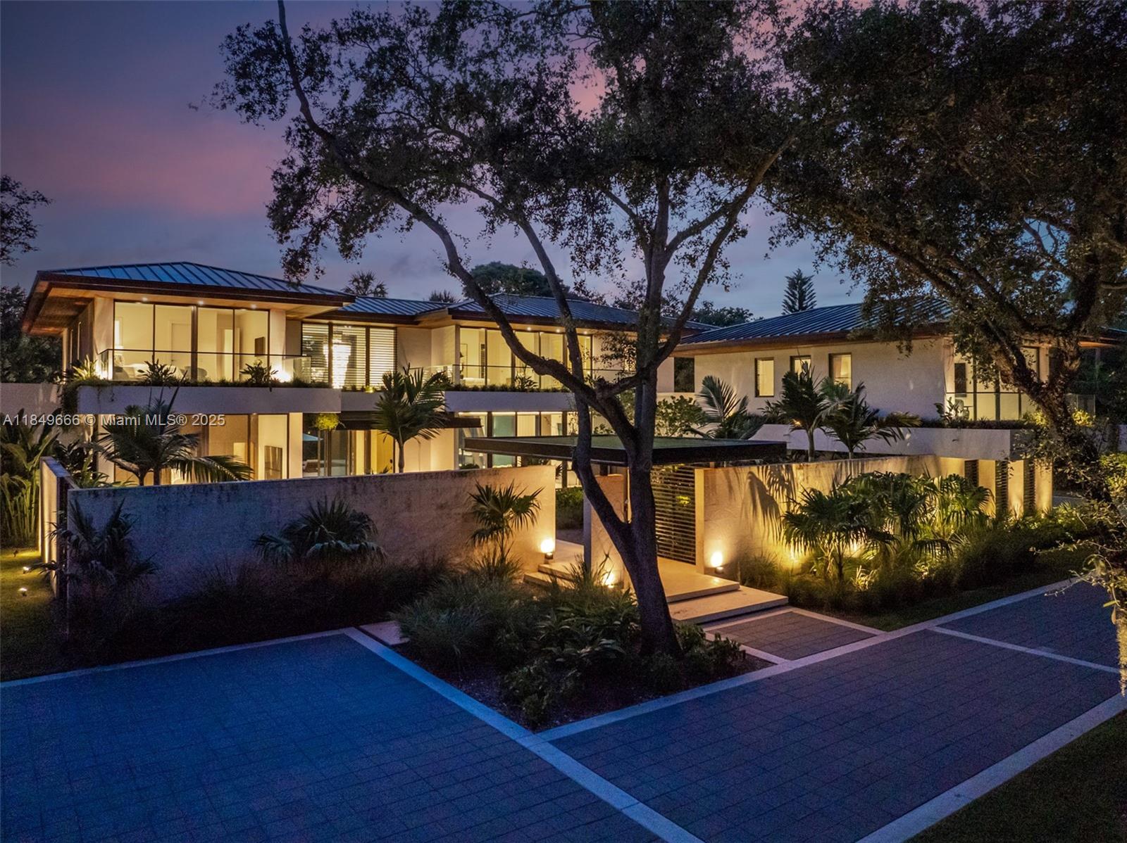 Designed and completed in 2023 by acclaimed architect Giorgio Balli, this architecturally striking & masterfully executed residence is a true work of art. Every detail, from the fluid layout to the custom finishes, is thoughtfully curated. Nestled in the prestigious, guard-gated Snapper Creek Lakes community, the residence offers 10,500SF of living space on a ±50,000 SF lot surrounded by majestic oaks & vibrant landscaping. Residents enjoy access to a private marina w/ direct Biscayne Bay access. Guest house & pickleball court plans have been designed. Ideally located along scenic Old Cutler Road, 10840 is moments from top-rated schools, world-class dining, & premier shopping. A rare opportunity to own a timeless estate that checks every box in one of Coral Gables’ most coveted enclaves.