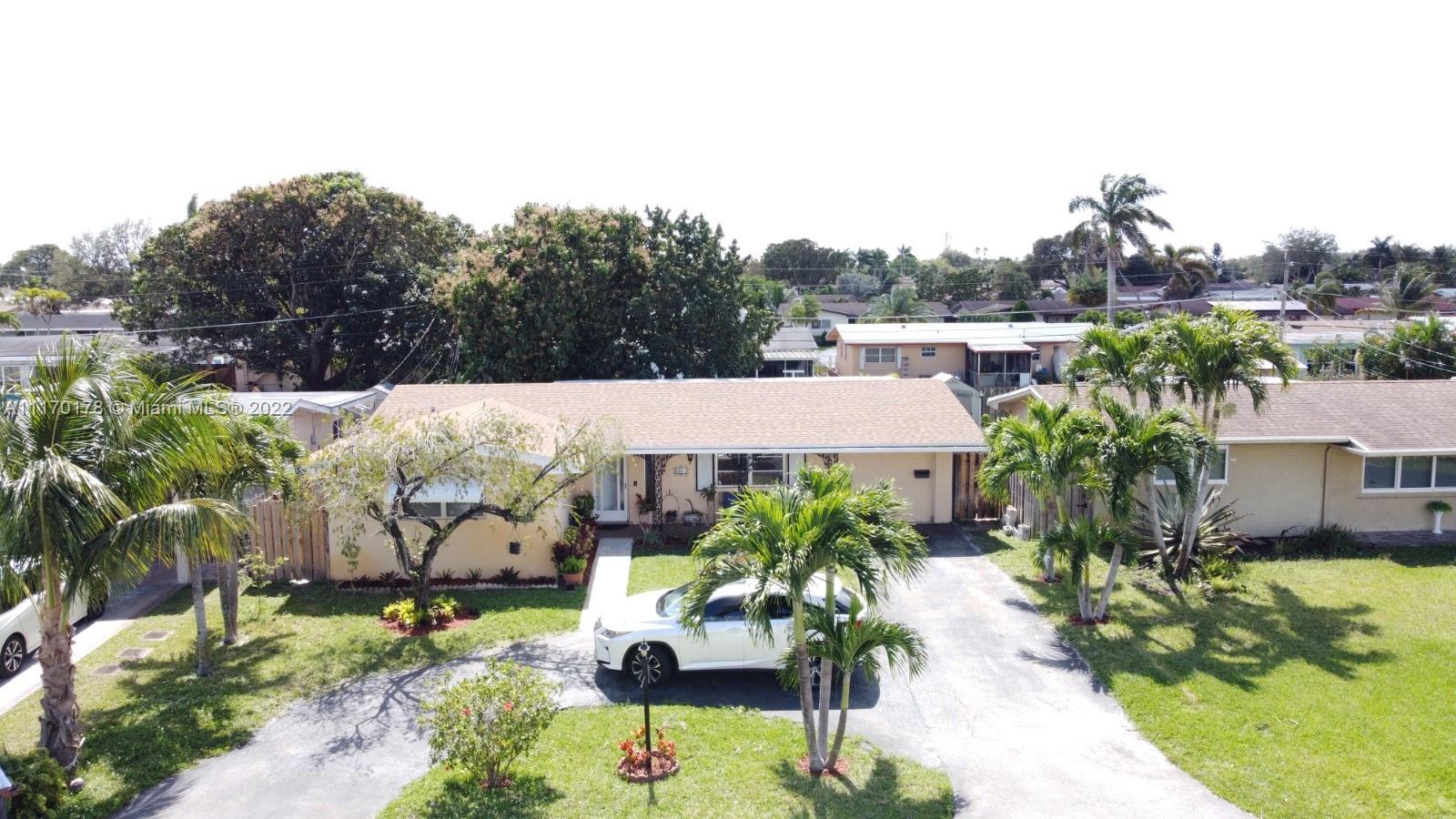 Immaculate Beautiful Ranch Style in highly sought after Pembroke Pines. Turn Key 2 BD/2 BA plus Office room, and play room, Large family room. Can easily be used as 2 more Bedrooms. Home boasts open floor plan, NO HOA, NEW ROOF, Newer Water Heater, Newer a/c, Beautiful tile floor through out, laundry room, Large private back yard w/above ground pool, fruit trees and storage unit. Long circular driveway for boat or RV parking. Covered front patio to enjoy. No HOA. Large walk - in closets. Perfect location, close to entertainment and Pembroke Pines Mall. Famous Hard Rock Casino, Top rated in the nation Joe DiMaggio Hospital and West Memorial Hospital. Rated Private schools Chaminade Madonna and Calvary Christian Hollywood close by.  Must see to appreciate large home!