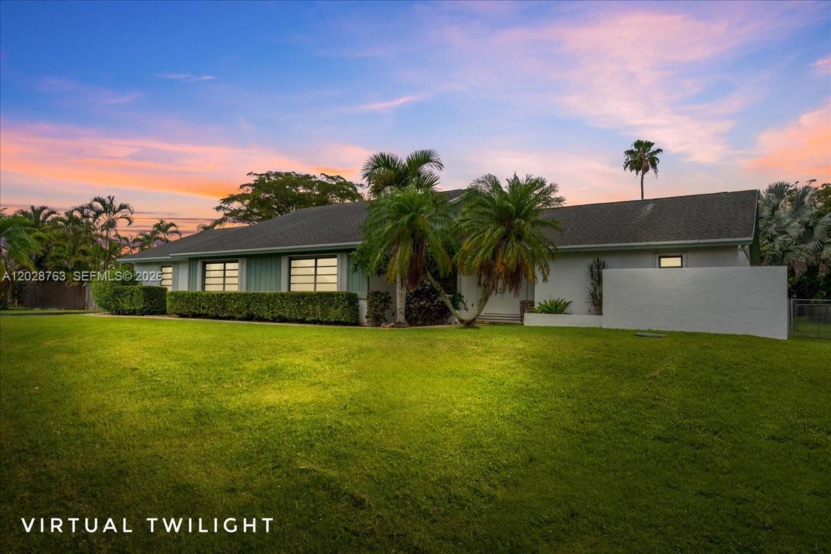 Welcome to your private oasis in Westbury Estates! This beautiful country-style home sits on a sprawling 27,500 sq ft lot and offers nearly 3,000 sq ft of comfortable living space.
Step inside to find a show-stopping kitchen that was recently remodeled with Calacatta Laza Quartz countertops, ample counter space, and a layout perfect for entertaining. It flows seamlessly into the bright dining room and spacious family room, creating an inviting heart of the home where everyone naturally gathers.
The split bedroom floor plan offers excellent privacy, with the primary suite featuring direct access to the back patio and pool area—perfect for your morning coffee or evening unwind.
Outside, the backyard is a true paradise. A huge in-ground pool anchors the space, surrounded by lush palm trees and productive fruit trees that make the yard feel like a private resort. Plenty of room for play, gardening, or simply relaxing under the Florida sky.
Located in the sought-after Westbury Estates neighborhood, known for its charming homes and oversized lots, this property offers easy access to Krome Avenue and the Florida Turnpike—ideal for Miami commuters.
Come experience the perfect blend of country charm and modern comfort.