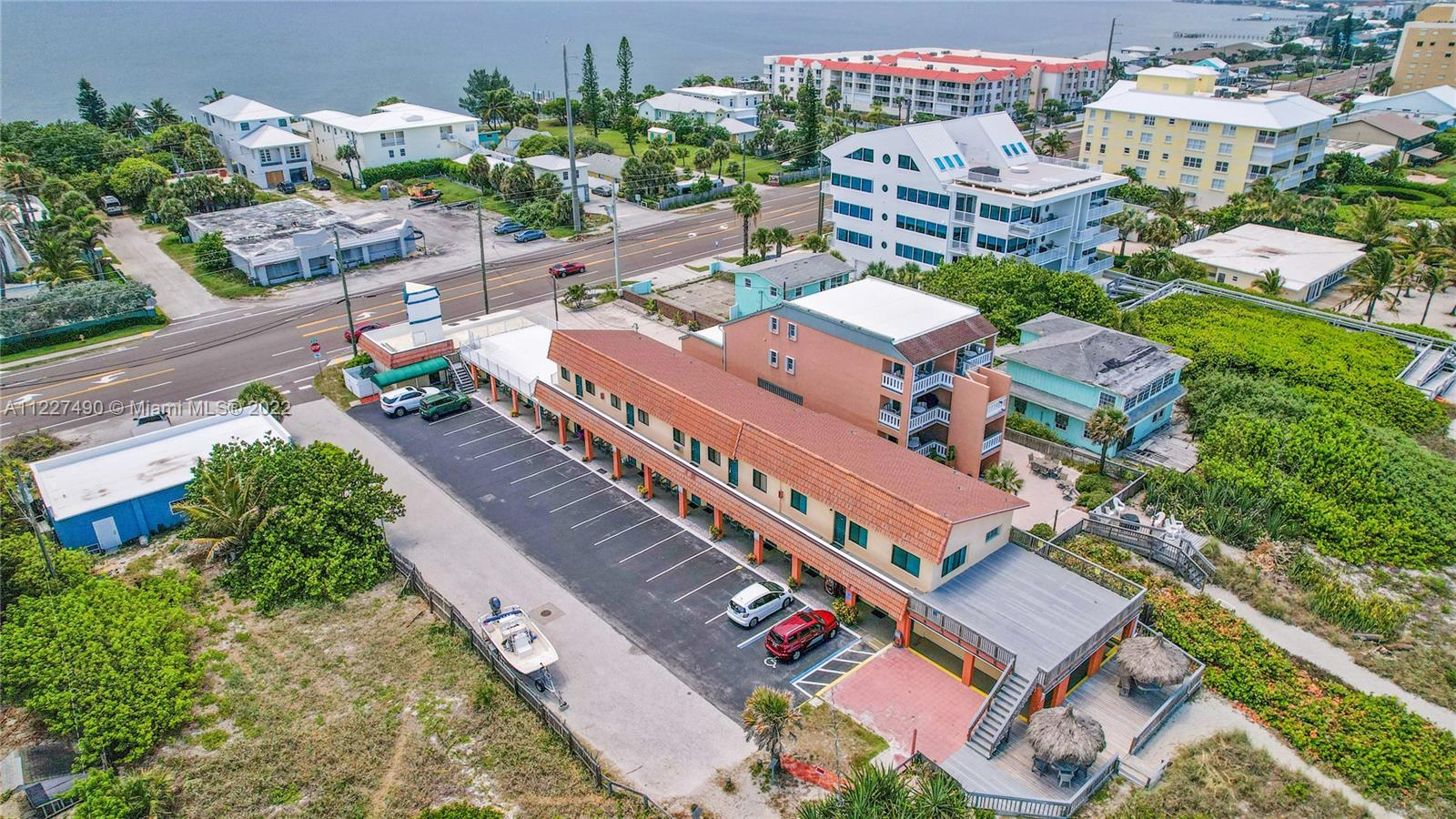Dreams Do Come True! Welcome to Anthony’s on the Beach Motel. One of the only Beach Front Motels you’ll find for sale that has been in business since the 1950’s. Property was rebuilt in 1985 with block construction and consists of 20 Units including Manager’s Room with full kitchen. The property has been fully remodeled recently. There are 3 Studio Single Bed units , 8 Double bed studios, 2 Beachfront singles, Four 2 bedroom Suites with full kitchens upstairs and one of which is a mega beachfront penthouse style with living room and one single studio with full kitchen. With a total of 9350 sqft of Living space and sitting on a 14,810 lot which includes beach property. Zoned RU230. Builders welcome.