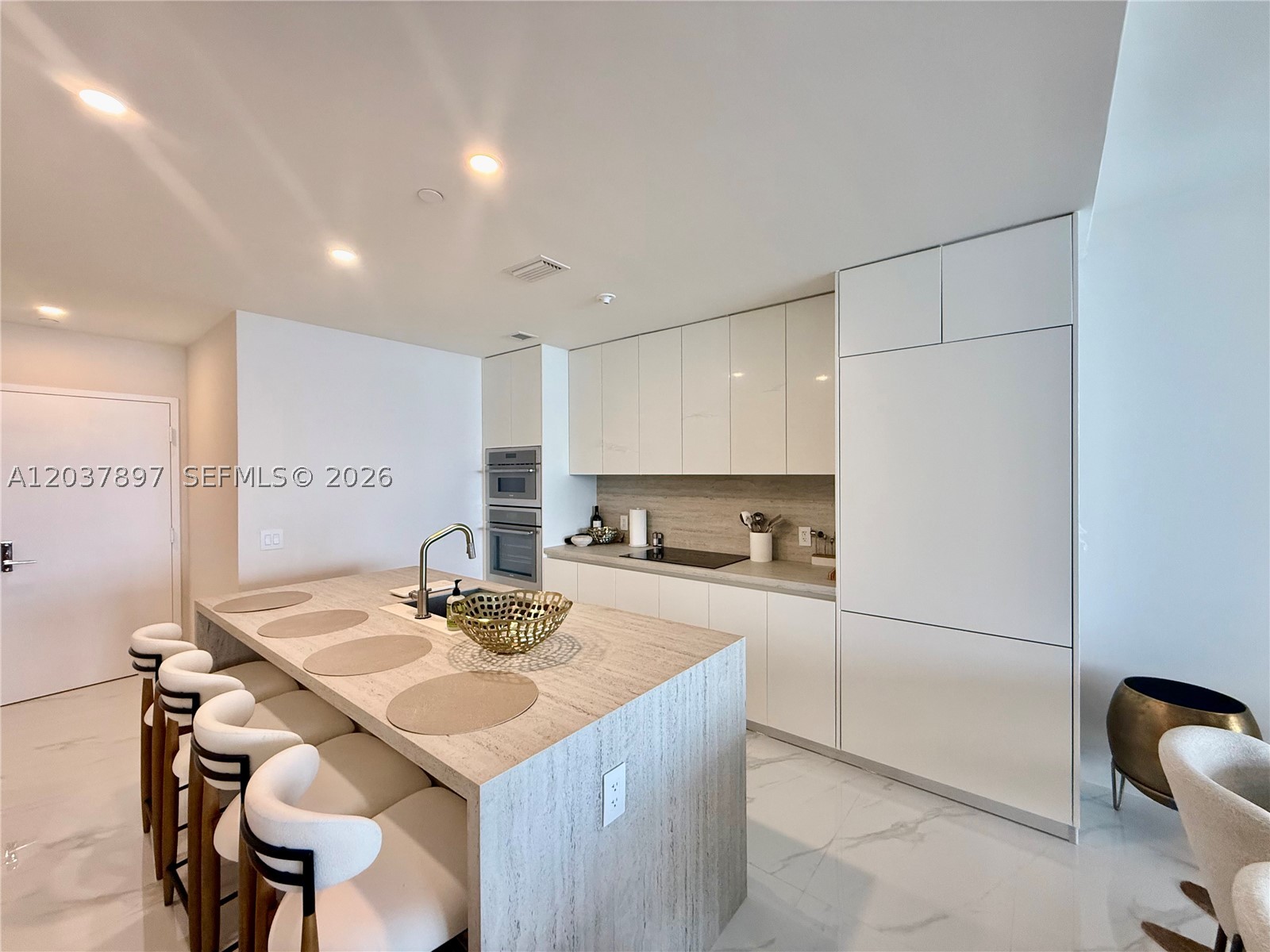 Available Terms & Rates: $10,000 (3-6 month) | $14,000 (1-2 months) A rare opportunity to lease a FULLY FURNISHED unit, outfitted by ARHAUS interiors! This unit is 2-bedroom + Den (with full size bed) with each room complimented with it's own 3 FULL bathroom. The interior space spans over to a well designed 1,545sf of interior space, accompanied by a fully private massive 264sf patio, with DIRECT panoramic east water views of the entire bay & ocean. Making the entire Miami Beach skyline your daily picturesque postcard view. Taking in breathless sunrise views, and flooded with natural light all day. All amenities included, as well as (1) parking space, with 24hr valet. Secure it for the upcoming season!!!