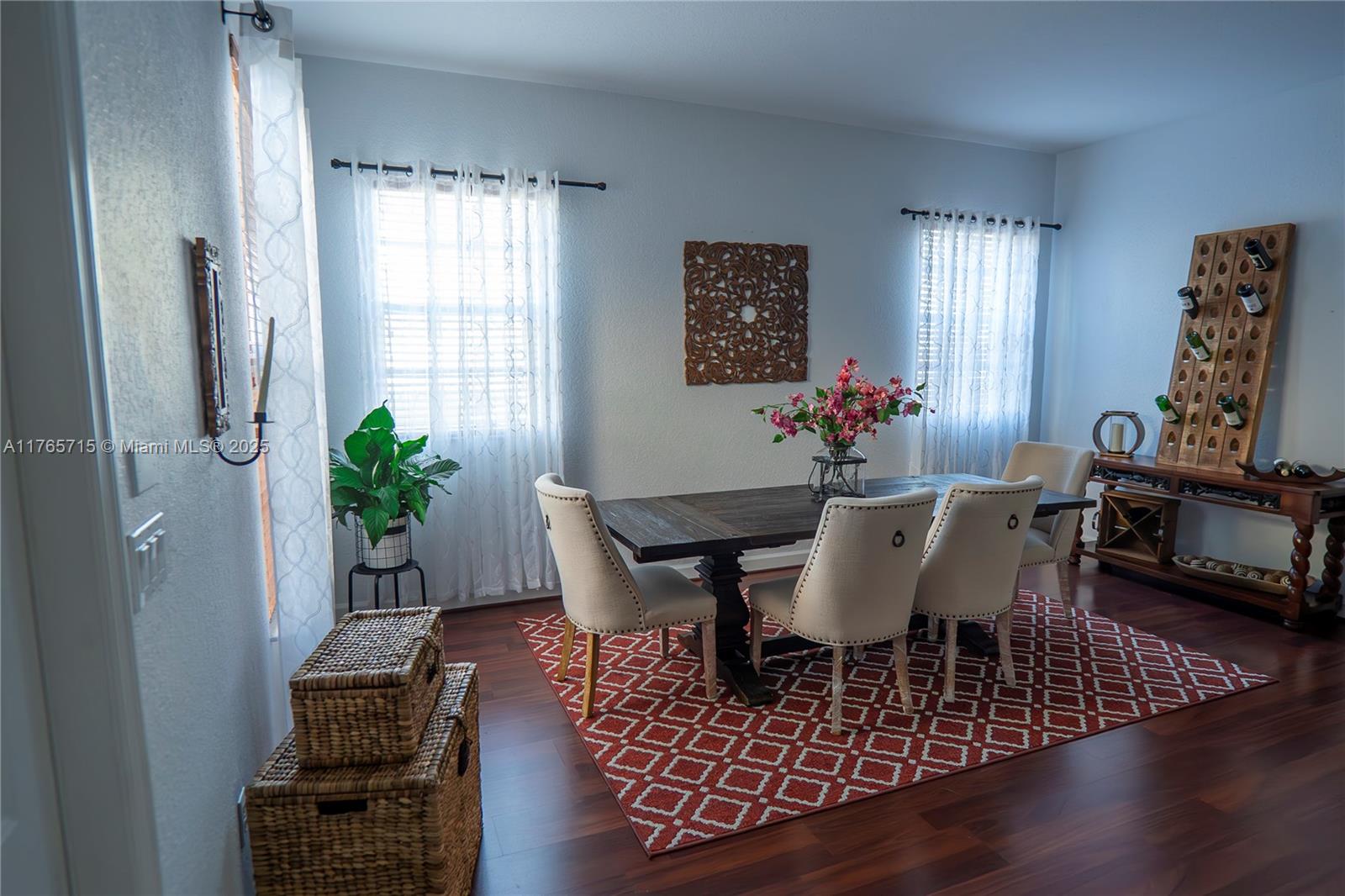 This beautifully priced townhouse is the best value in the community! Featuring 3 bedrooms, 2,5 baths, and a loft, is located in the desirable gated community of Cobblestone. The open plan boasts high ceilings and a modern design. The kitchen with granite countertops and stainless-steel refrigerator. Enjoy wood flooring throughout, the primary bedroom offers two walk-in closets and an in-suite bathroom with double vanities. 2-car garage. The community offers 24/7 security, resort-style amenities including a pool, gym, playground, and clubhouse, plus access to A+ schools, this home has it all. Conveniently located near I-75, Whole Foods, Publix, Costco, Pembroke Gardens, Pembroke Lakes Mall, and top-rated restaurants. Don't miss this incredible opportunity to own in this fantastic community