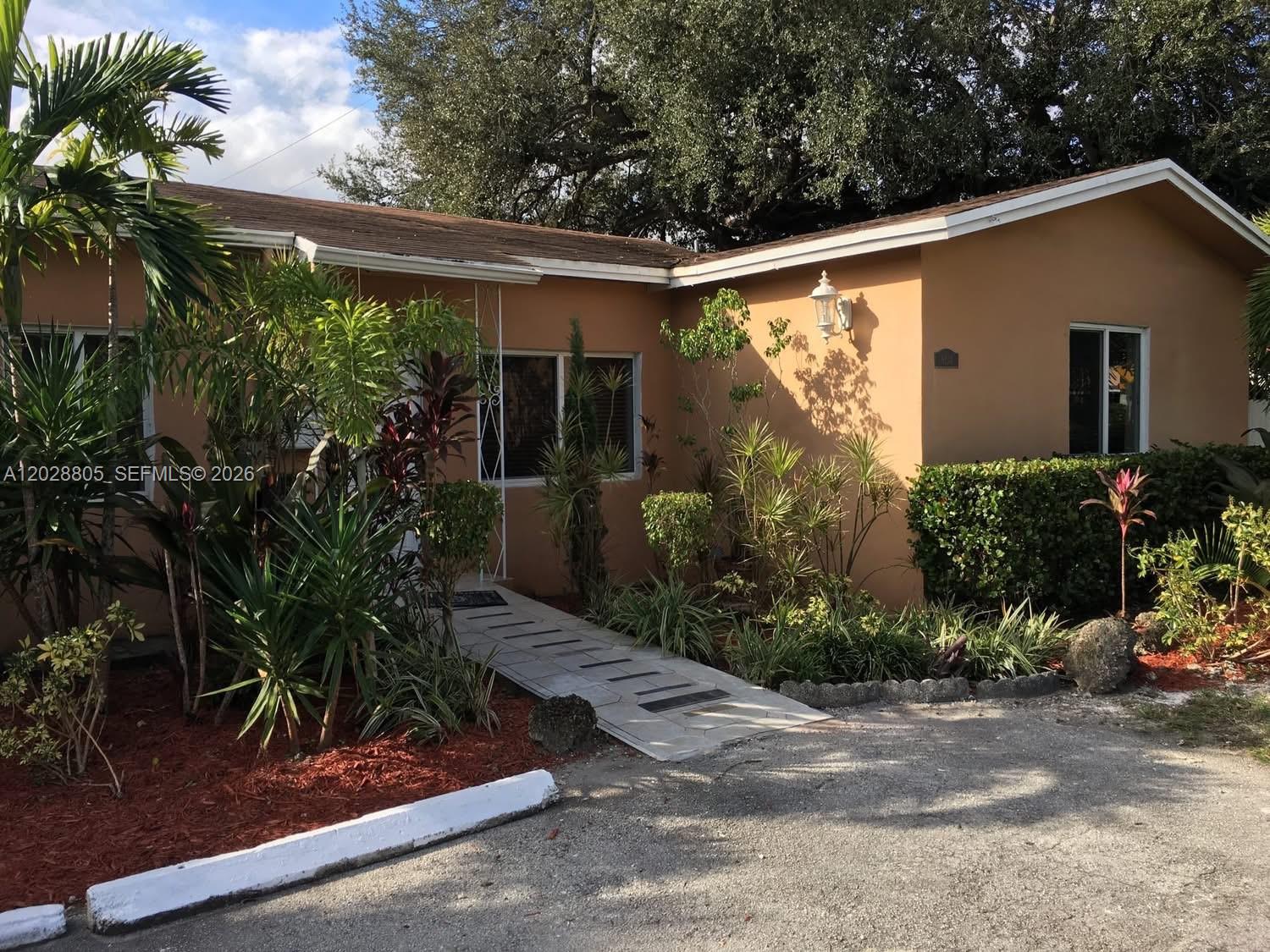 Spacious primary bedroom with large closet, his and hers vanity/shower, brand new aluminum roof, impact windows, granite counter tops, wood cabinets in the kitchen area, all bathrooms are completely tiled, travertine floors, two patio areas. Come live in central Miami minutes from MIA. Call me direct owner/agent.