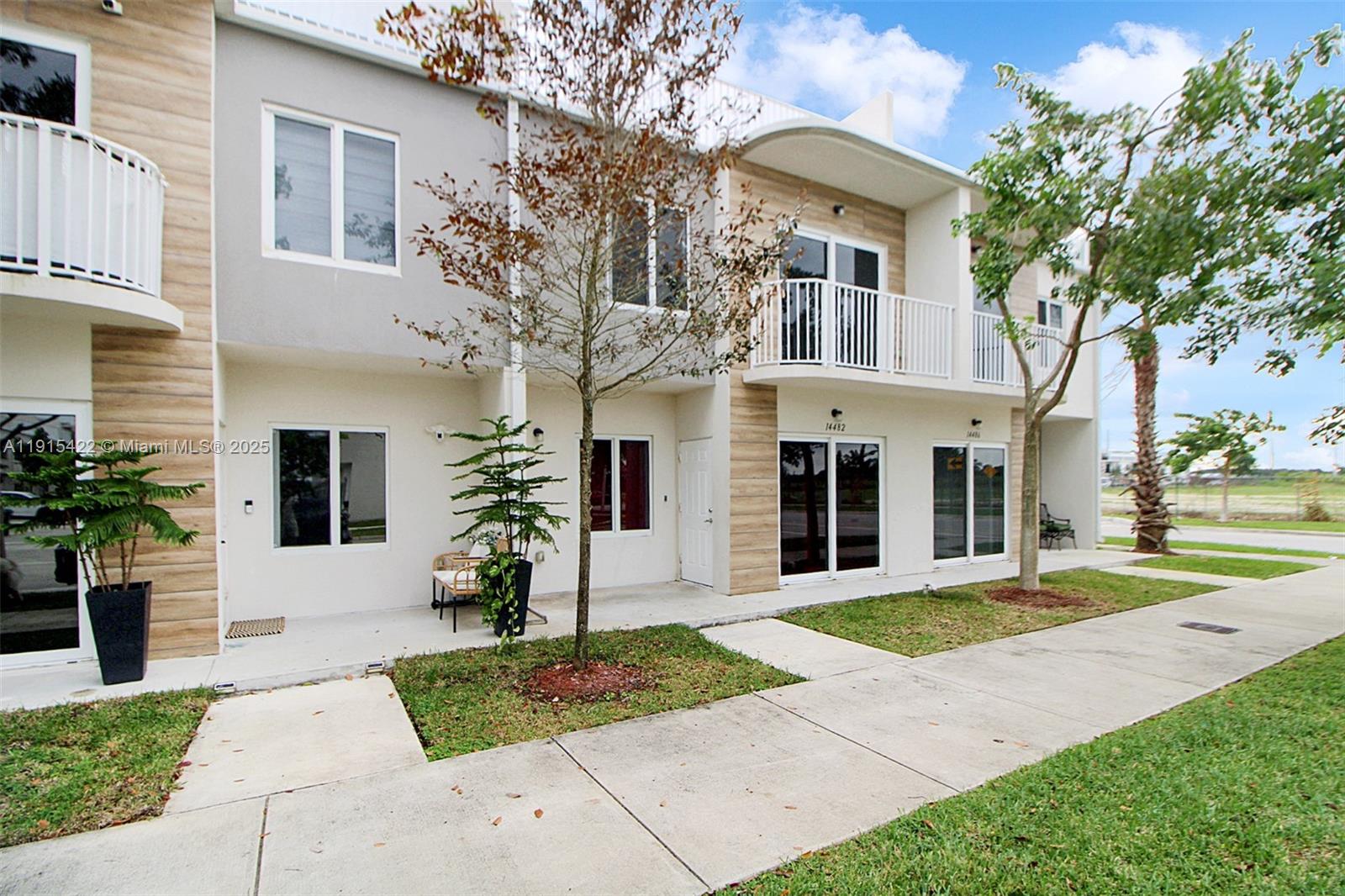 LUXURY INVESTMENT OPPORTUNITY! Stunning 3-floor modern townhome offering 4 bedrooms, 3.5 baths, an open layout, and an expansive private terrace perfect for relaxing or entertaining. The first floor includes a full bedroom with an en-suite bathroom, ideal for guests, in-laws, or added rental potential. This energy-efficient home features premium stainless steel appliances, impact-resistant windows and doors, and sleek contemporary finishes throughout. Perfectly located near top-rated schools, shopping centers, dining, parks, and major routes, providing exceptional convenience and lifestyle. Bright interiors, spacious rooms, and elegant design make this townhome truly stand out. Property is VACANT and very easy to show—schedule your private tour today!