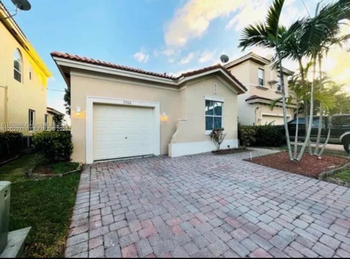 Beautiful house at Portofino Palms gated community. 3 beds 2 baths with water view and yard. 1 car garage parking. New appliances and fresh painted. Club house with community pool and gym.