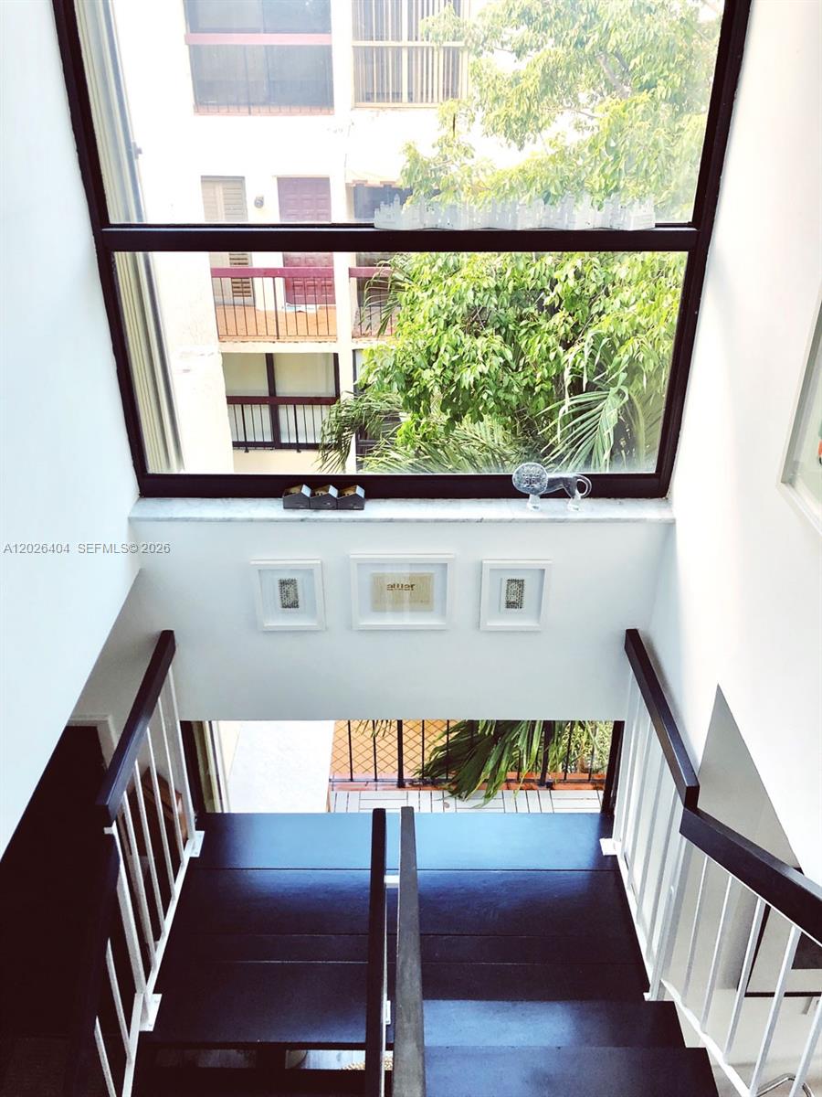 Some homes are just lived in. This one was considered. Owned and curated by a creative director and photographer, this fully renovated two-story townhouse at Brickell Forest is a study in restraint and light; minimal by intention, beautiful by design. Clean lines, thoughtful finishes, and an effortless calm that feels worlds away from the city, even though you're steps from the heart of Brickell.

The corner position delivers an abundance of natural light that pours through at every hour. At 2 beds / 2.5 baths, the layout flows with an open, airy sensibility, two private bedrooms upstairs, living spaces below that breathe. Every detail has been updated, nothing to do but move in and enjoy.

Set within a lush, gated pet-friendly community with a genuine neighborhood feel, 24-hour security, pool, and tennis courts. In-unit washer/dryer, garage parking, and new hurricane shutters complete the picture.

Property is currently rented in a month-to-month basis.