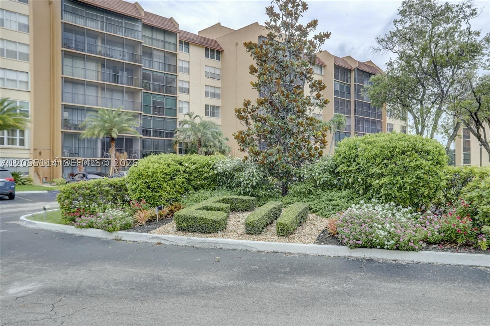 Welcome to this beautifully updated 2-bedroom, 2-bath condo with 1,296 sq ft, in the serene 55+ Environ community. This spacious residence features an additional flexible living area, perfect for a den, family room, or home office. The open-concept kitchen is beautifully updated with stainless steel appliances, creating an inviting space for cooking and entertaining. The functional layout offers generously sized bedrooms, enhanced with modern zebra blinds, while tasteful lighting fixtures throughout the home add warmth and elegance. Relax on your private screened balcony and enjoy peaceful golf course and garden views. Residents enjoy a beautifully maintained community with resort-style amenities, including a clubhouse, pool, fitness center, tennis courts, and walking paths. Conveniently located near shopping, dining, medical facilities, and major highways, this home offers the perfect blend of comfort, style, and convenience. Don't miss this opportunity to own a move-in-ready home in one of Lauderhill's most desirable 55+ communities.
