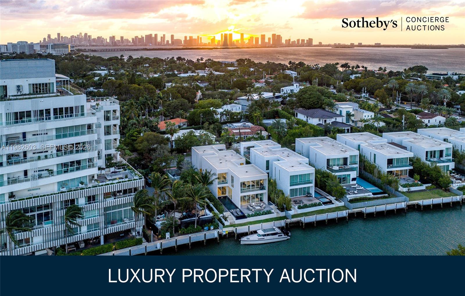 AUCTION BIDDING OPEN: Bidding ends May 7th. Previously Listed $9.499M. Current High Bid $6.6M. Showings Sat and Sun from 1:00 PM - 3:00 PM and by appointment.
One of only eight, this fully furnished two-story waterfront villa at The Ritz-Carlton Residences, Miami Beach represents an unparalleled convergence of private residential living and five-star hospitality. Designed by Piero Lissoni and elegantly appointed with furnishings from Poltrona Frau, the residence commands Surprise Lake with direct access to Biscayne Bay, the Intracoastal Waterway, and the Atlantic Ocean via a private boat dock. Expansive walls of glass dissolve the boundary between interior and water, while lush landscaping and a two-car garage complete the estate experience. Residents enjoy the full complement of Ritz-Carlton amenities: rooftop pool with cabanas, spa, fitness center, meditation garden, art studio, billiard room, and dedicated concierge staff—all within one of Miami Beach's most prestigious addresses.