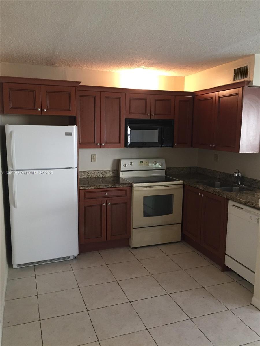 CORAL VILLAGE CONDO - Residential Lease