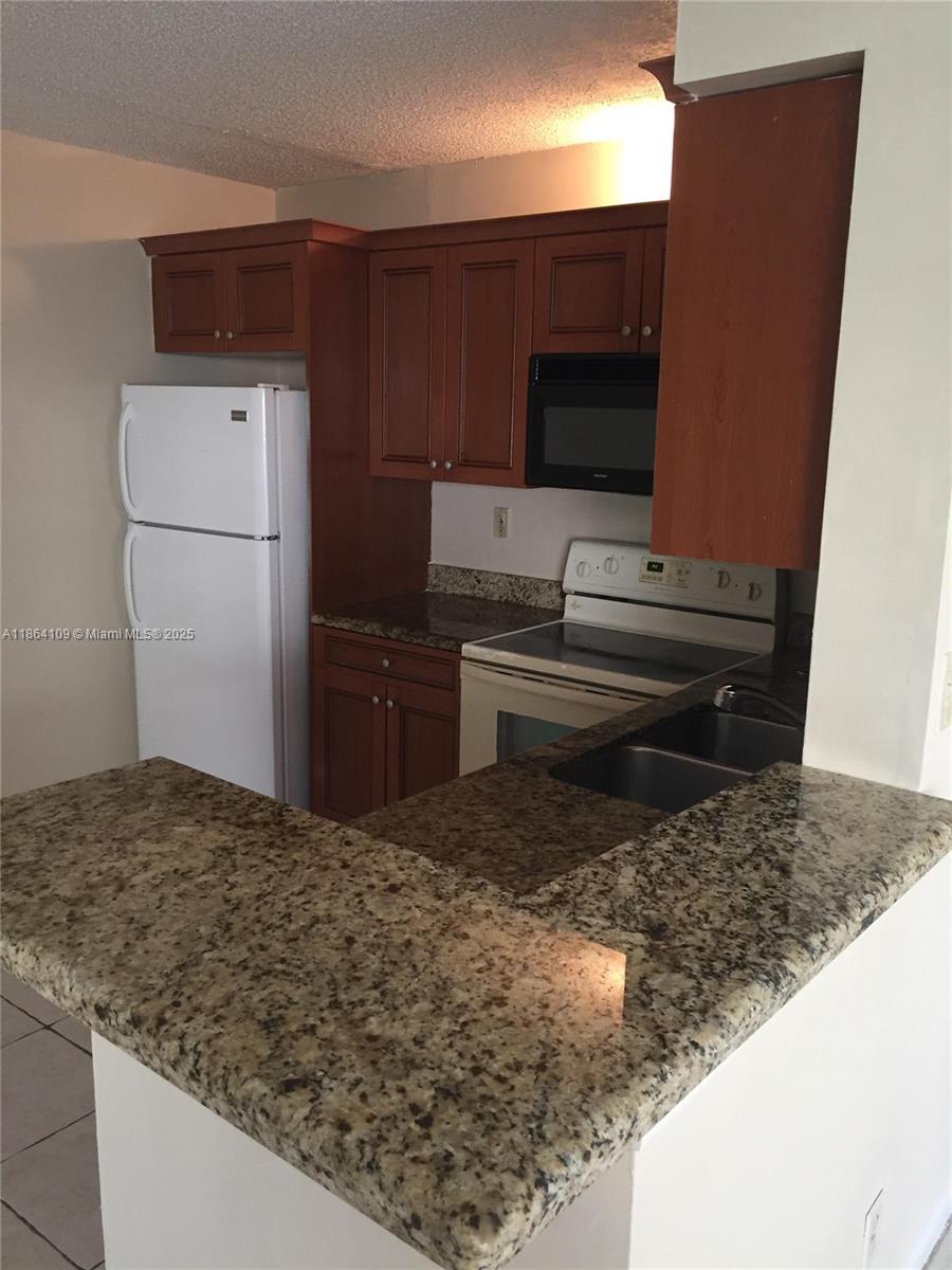 CORAL VILLAGE CONDO - Residential Lease