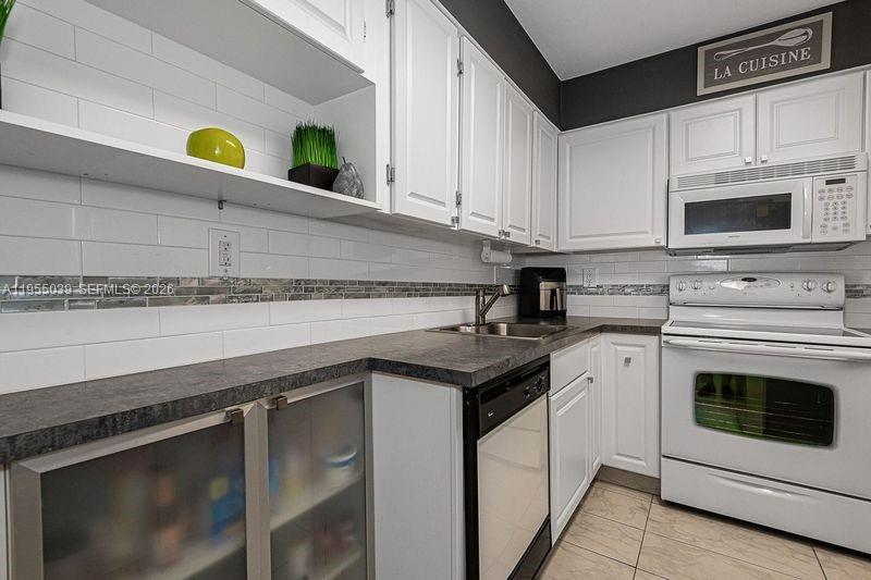 **DONT MISS THIS SPACIOUS AND AFFORDABLE UNIT RIGHT IN THE HEART OF SUNNY ISLES.** JUST STEPS FROM THE BEACH, STORES, RESTAURANTS AND MORE...**ALL AGES WELCOME,  SAVE THOUSANDS AS THIS ONE ALREADY HAD HURRICANE DOORS AND WINDOWS REPLACED, CAN BE RENTED RIGHT AWAY (ONCE A YEAR), PARTIALLY COVERED GARAGE PARKING AND VERY CLOSE TO YOUR UNIT DOOR, NO NEED TO TAKE THE ELEVATOR TO GET TO YOUR UNIT, ROOFTOP POOL, SOLD COMPLETELY FURNISHED (JUST A COUPLE SMALL PERSONAL ITEMS WILL BE REMOVED) .  ** P.S. 50 YEARS CERTIFICATION DONE AND ALL ASSESSMENT PAID OFF ALREADY**