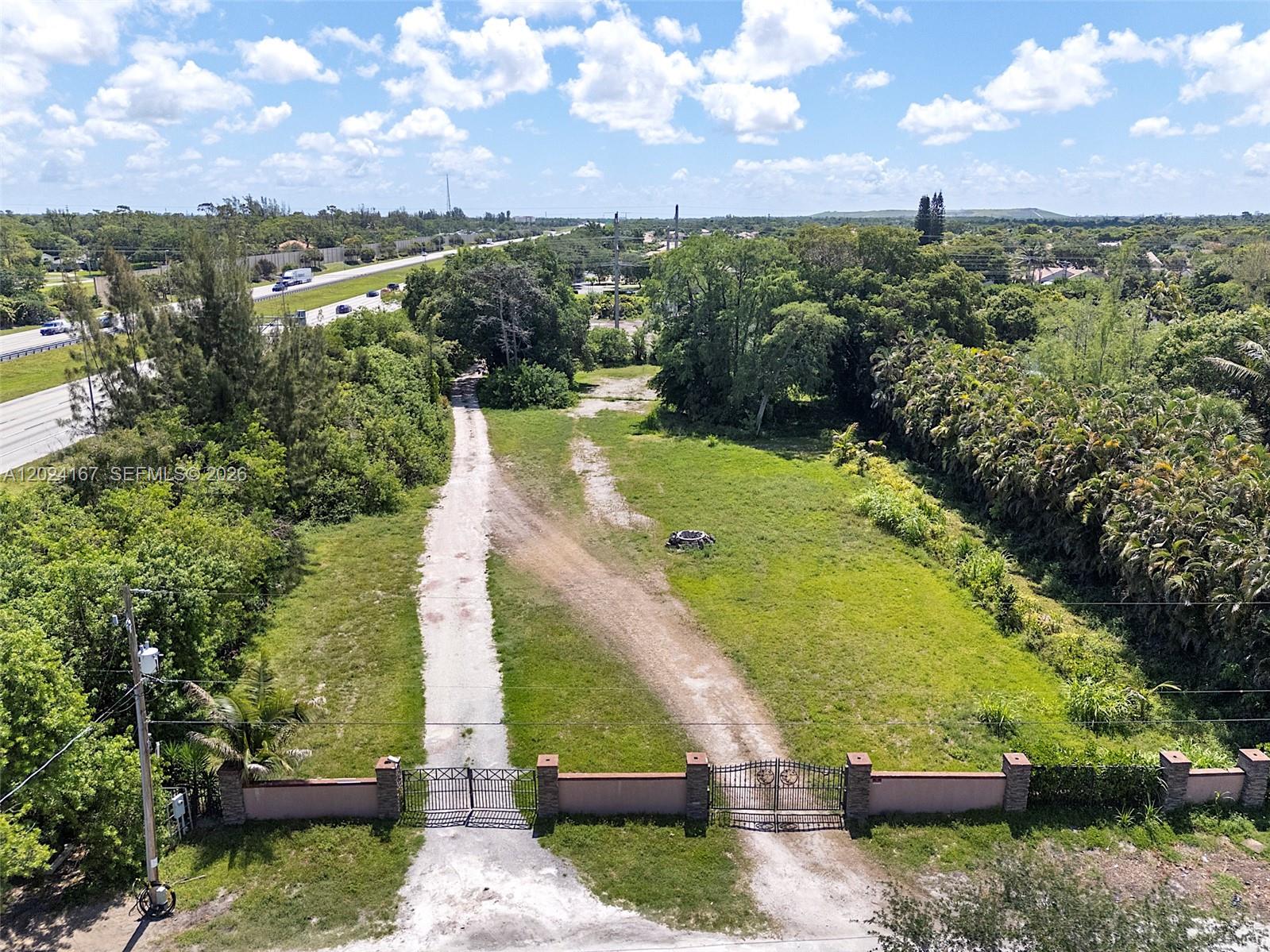 COURT ORDERED SALE! Rarely available 2.5-acre estate parcel at the end of Pinetree Road in the highly sought-after Country Acres enclave of Parkland. This private property is zoned A-1 Agricultural-Residential, offering a unique opportunity for buyers seeking estate living, equestrian use, or agricultural flexibility in one of South Florida’s most desirable communities. The A-1 zoning designation permits a wide range of residential and agricultural uses, including horses, stables, barns, paddocks, hobby farming, nurseries, orchards, gardens, and other agricultural activities. Take advantage of this increasingly rare opportunity to own usable acreage with agricultural zoning in Broward County. This offering is in connection with a Receivership sale and is subject to court approval. The property is being sold “As-Is, Where-Is” with no representations, warranties, or guarantees of any kind, whether expressed or implied, by the Receiver and/or its professionals. Buyers are responsible for conducting their own independent due diligence. Listing is subject to errors and omission.