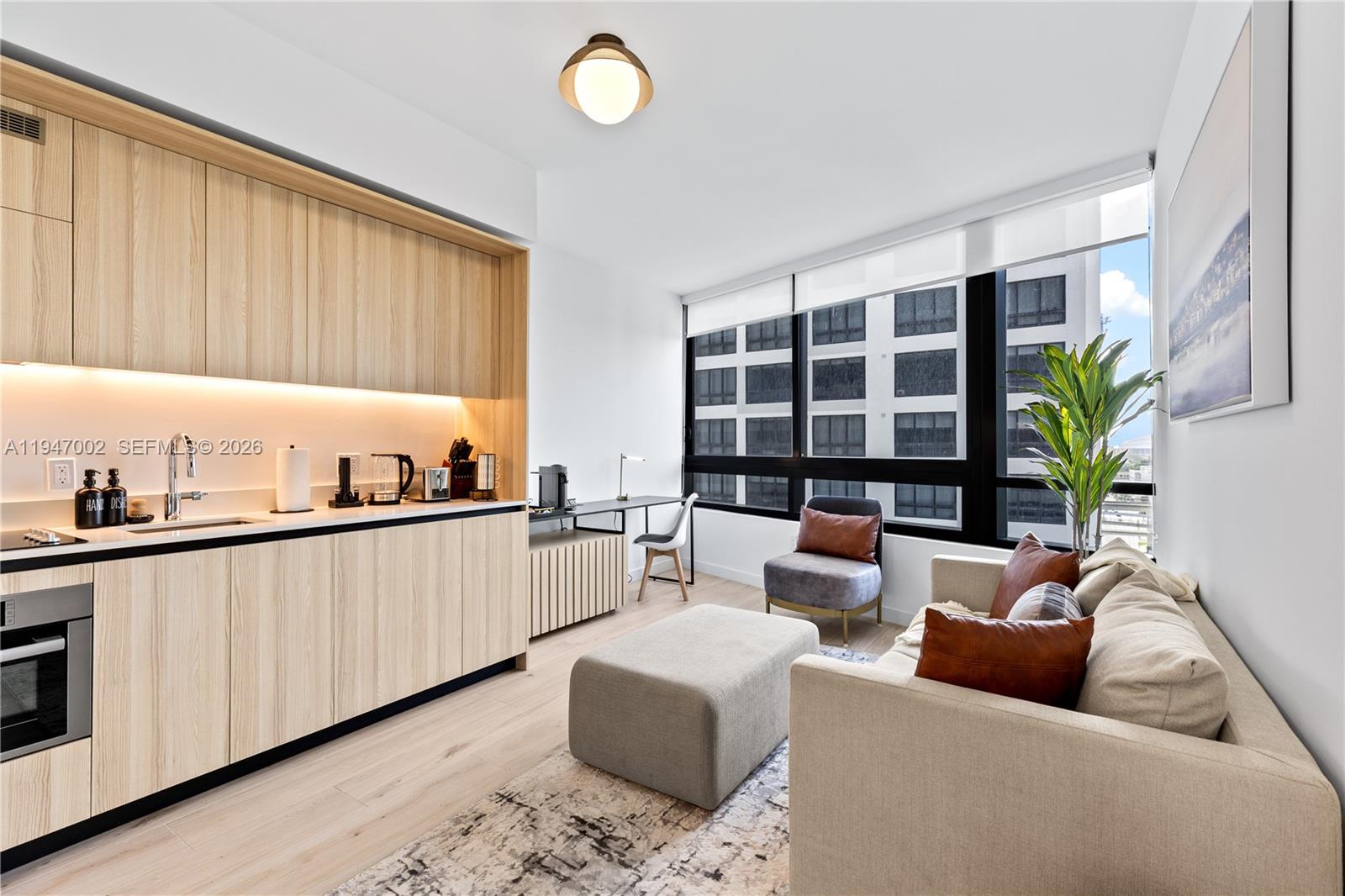 Experience luxury urban living at District 225, Miami’s premier full-service condominium designed for both residents and investors. This fully furnished 1-bedroom, 1-bath residence features 9 ft. ceilings, contemporary finishes, and smart-home technology. The gourmet kitchen is equipped with custom Italian cabinetry and premium Bosch appliances, including a paneled refrigerator, dishwasher, built-in convection oven, and cooktop. Additional features include built-out closets, a full-size washer/dryer, and a spa-inspired bathroom with Italian vanities and a rain shower.

District 225 was intentionally designed for short-term rental flexibility, allowing owners to host with ease. An on-site concierge team is available to assist with Airbnb operations and guest support—making this an exceptional opportunity for investors.

Residents enjoy resort-style amenities, including an expansive pool deck with bar and lounges, state-of-the-art fitness center, yoga and spinning studios, indoor basketball court, rock-climbing wall, racquetball court, full-service spa, and a dedicated co-working floor with private meeting rooms. The rooftop deck offers a plunge spa, fire pit, summer kitchen, and panoramic views of Downtown Miami and Biscayne Bay.

Prime location, luxury living, and turnkey rental capability—this residence at District 225 offers unmatched lifestyle and investment potential in the heart of Miami.