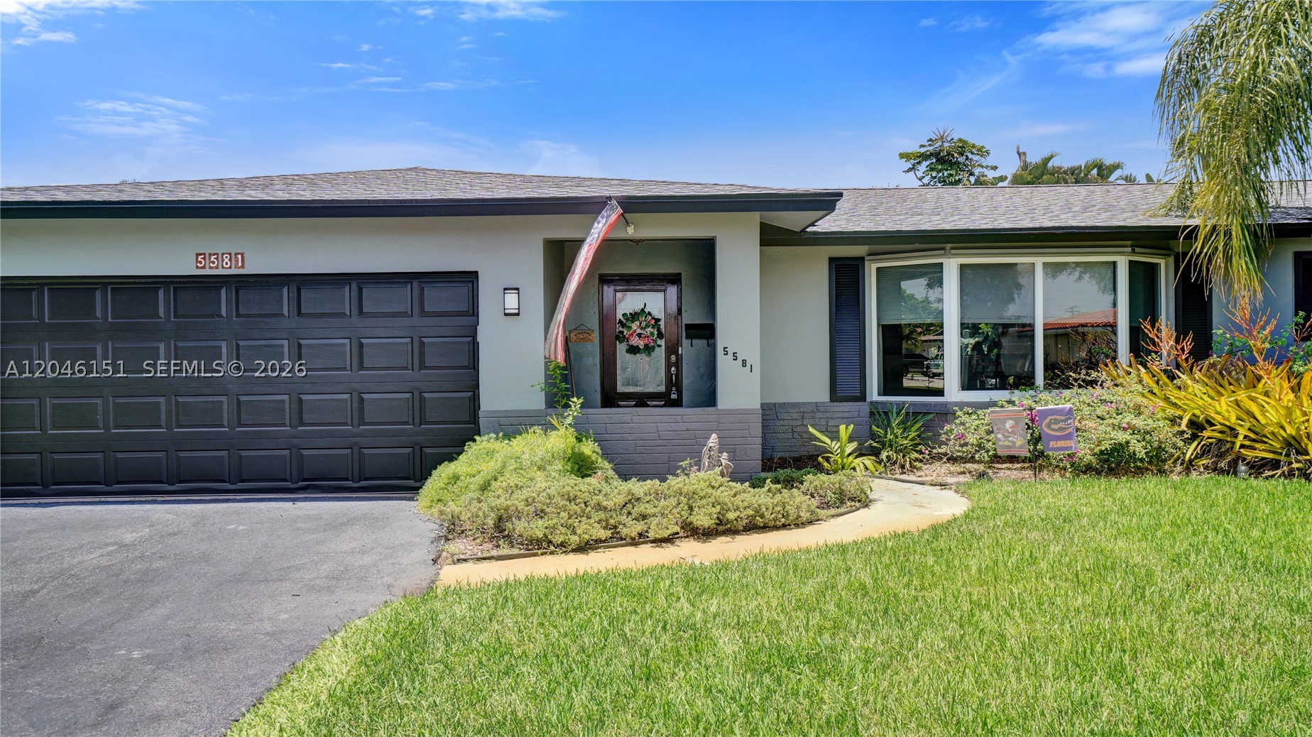 Located in Plantation Park, the sought after neighborhood with beautiful tree lined streets.  This 4 bedroom 2 bath REMODELED home features NEW MAIN ROOF & FLAT ROOF(2025) and COMPLETE HURRICANE PROTECTION WITH IMPACT WINDOWS AND DOORS,. Home also features an eat in, gourmet Kitchen with lots of cabinets, granite counters & stainless steel appliances. Formal dining room, large living room & separate family room. new flooring in most living areas. Separate & large laundry room with washer/dryer, laundry tub and newer 2nd fridge (which will stay with home). Primary bedroom with laminate floors and spacious his and hers closets. Remodeled primary bath with walk in shower and frameless door. Guest/cabana bath also beautifully remodeled with a frameless bathing door and fogless, storage mirror. Enjoy your backyard retreat starting with a covered and spacious back patio where you can entertain guests, sip your morning coffee, or relax with an evening glass of wine. You have a fully fenced, private yard perfect for the kids and dogs to play freely and a refreshing pool for all to enjoy.  other home features include lots of closet/storage space, yard sprinkler system, updated plumbing fixtures, spacious bedrooms, all situated on almost 1/3 acre lot!!! Walk to elementary school, Fig Tree Park and Heritage Park. Centrally located close to malls, restaurants, major roads. 20 minutes to airport & to beaches. BEST OF ALL NO HOA!  (PROFESSIONAL PICTURES TO COME SOON!).