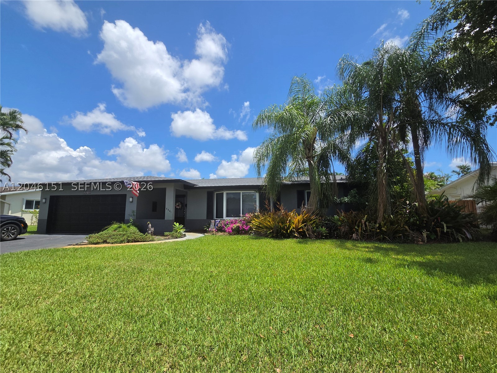 Located in Plantation Park, the sought after neighborhood with beautiful tree lined streets.  This 4 bedroom 2 bath REMODELED home features NEW MAIN ROOF & FLAT ROOF(2025) and COMPLETE HURRICANE PROTECTION WITH IMPACT WINDOWS AND DOORS,. Home also features an eat in, gourmet Kitchen with lots of cabinets, granite counters & stainless steel appliances. Formal dining room, large living room & separate family room. new flooring in most living areas. Separate & large laundry room with washer/dryer, laundry tub and newer 2nd fridge (which will stay with home). Primary bedroom with laminate floors and spacious his and hers closets. Remodeled primary bath with walk in shower and frameless door. Guest/cabana bath also beautifully remodeled with a frameless bathing door and fogless, storage mirror. Enjoy your backyard retreat starting with a covered and spacious back patio where you can entertain guests, sip your morning coffee, or relax with an evening glass of wine. You have a fully fenced, private yard perfect for the kids and dogs to play freely and a refreshing pool for all to enjoy.  other home features include lots of closet/storage space, yard sprinkler system, updated plumbing fixtures, spacious bedrooms, all situated on almost 1/3 acre lot!!! Walk to elementary school, Fig Tree Park and Heritage Park. Centrally located close to malls, restaurants, major roads. 20 minutes to airport & to beaches. BEST OF ALL NO HOA!  (PROFESSIONAL PICTURES TO COME SOON!).