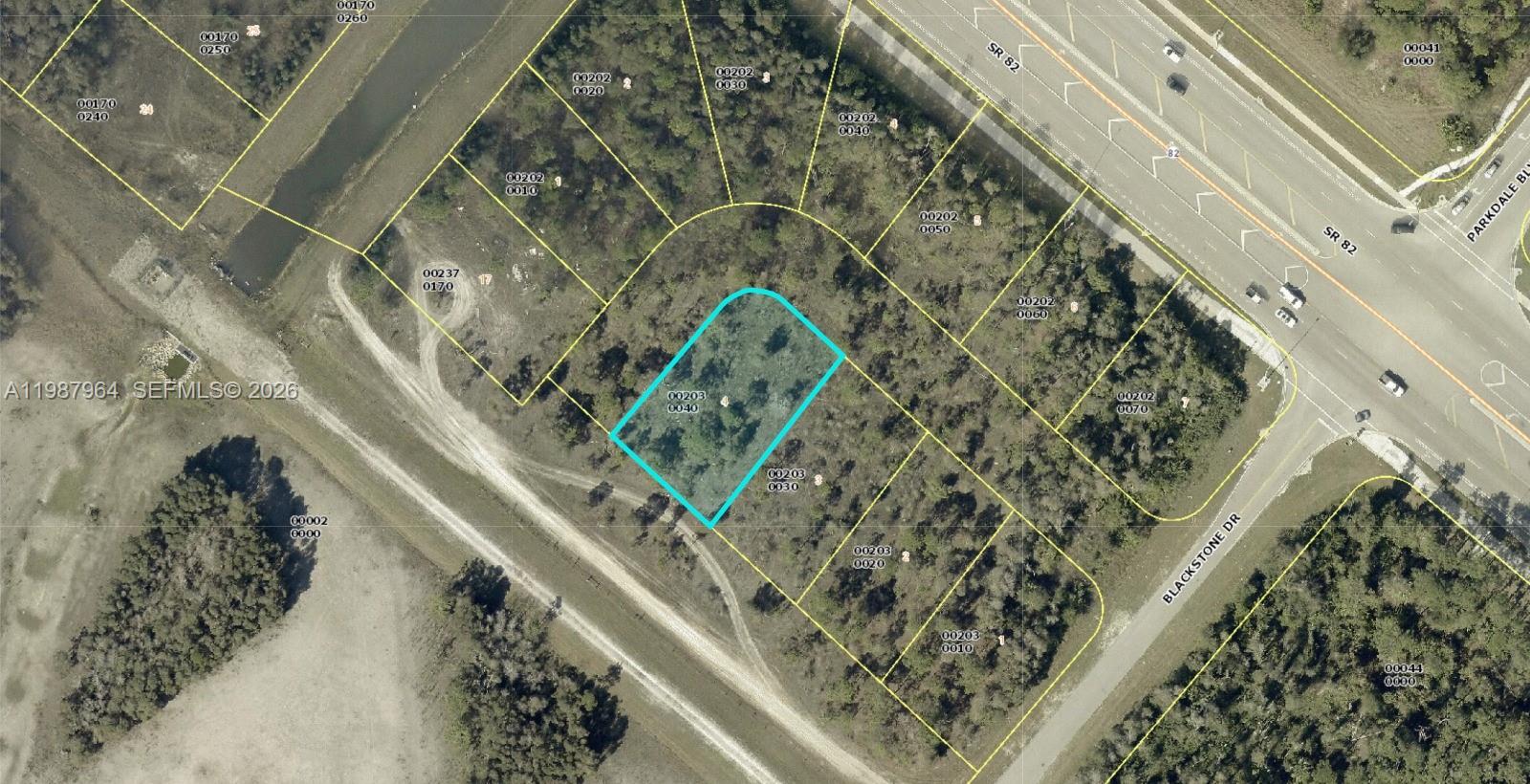 Large corner lot near SR82 with access to shopping, major roads, parks, schools and no HOA. This .30 acres located in Ft Myers is perfect for builders, investors, or an individual wishing to construct their dream home in a fast growing area. Not in a flood zone, don’t miss out!
