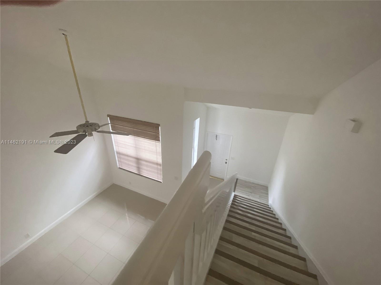 Hurry! won't last. Beautiful three-bedroom townhouse Grade A+ schools nearby. Freshly painted, new laminated wood on the second floor. One car garage and space for three additional cars if needed. Well-maintained community, large Olympic size pool Jacuzzi, tennis courts, & kids' play area. Close to I-595 and I-75.