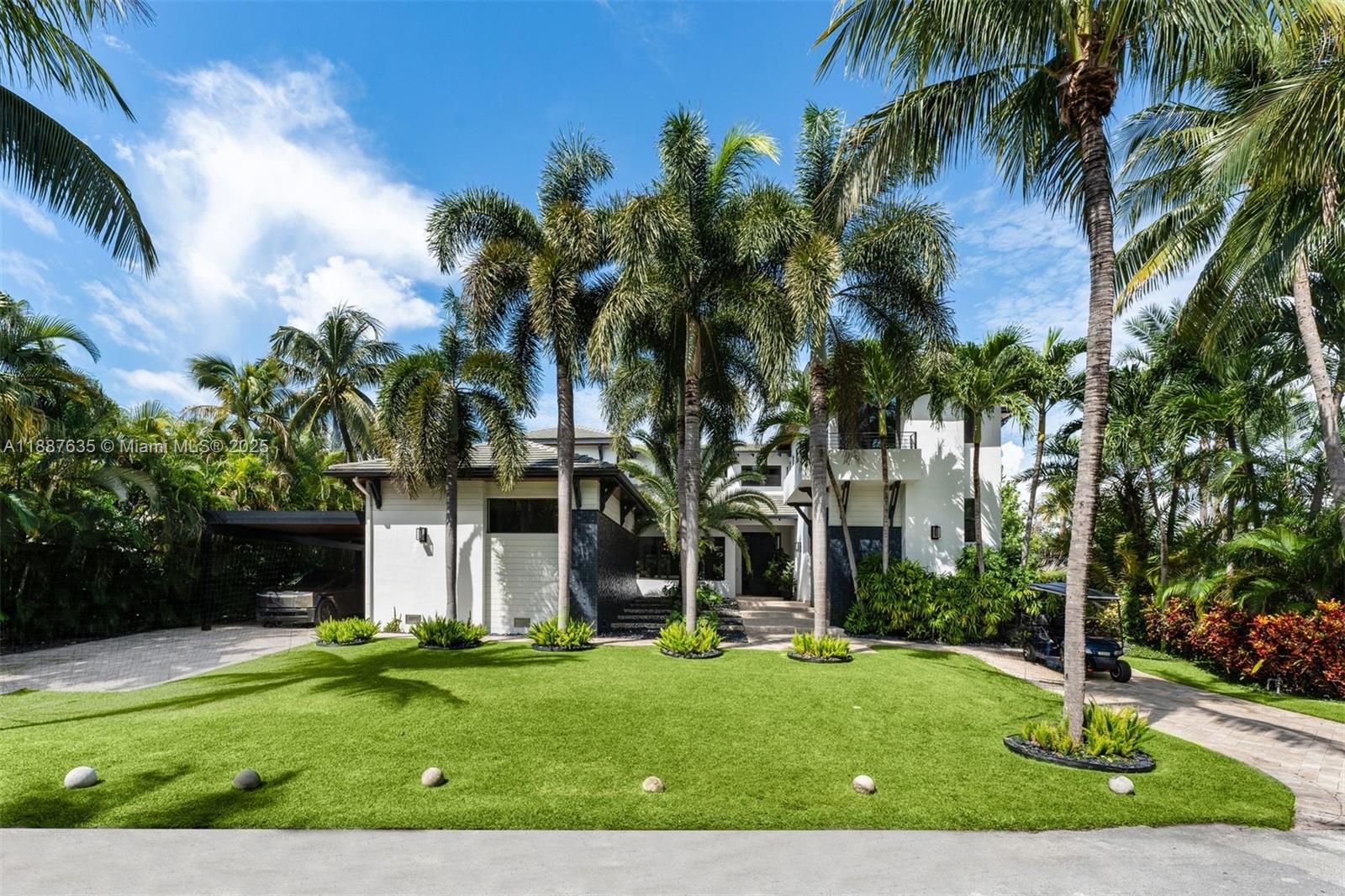 This stunning residence, set on an oversized 12,262 SF lot, offers 5,528 SF of beautifully designed interiors filled with natural light. An open floor plan with soaring ceilings creates a seamless sense of space, while the gourmet kitchen and expansive living areas are perfect for both everyday living and entertaining.
Featuring 6 spacious en-suite bedrooms, a powder room that also serves as a convenient cabana bath, and exceptional walk-in closets, this home combines comfort with sophistication. Step outside to your private oasis, where a jacuzzi, outdoor shower, and lush tropical landscaping provide the ultimate retreat.
Ideally located within walking distance of the beach, this Key Biscayne gem perfectly blends elegance and lifestyle on one of Miami’s most coveted island communities.