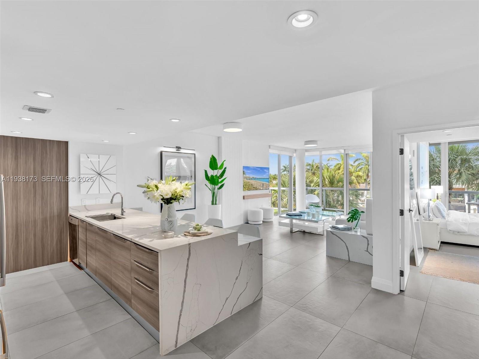 Have you ever dreamt of living on an island? Welcome to Bay Harbor Islands. This exceptional 3-bedroom corner waterfront gem at KAl isn't just a condo, it's a quiet escape. Your private balconies offer a front-row seat to glowing sunsets over calm waters. Inside, minimalist elegance flows effortlessly, with every detail whispering luxury. The layout flows, grounded, alive. Boat lover? The building offers a marina with slips. It's not just rare, it's one of a kind. Nothing else on the island lives quite like this. Will you?