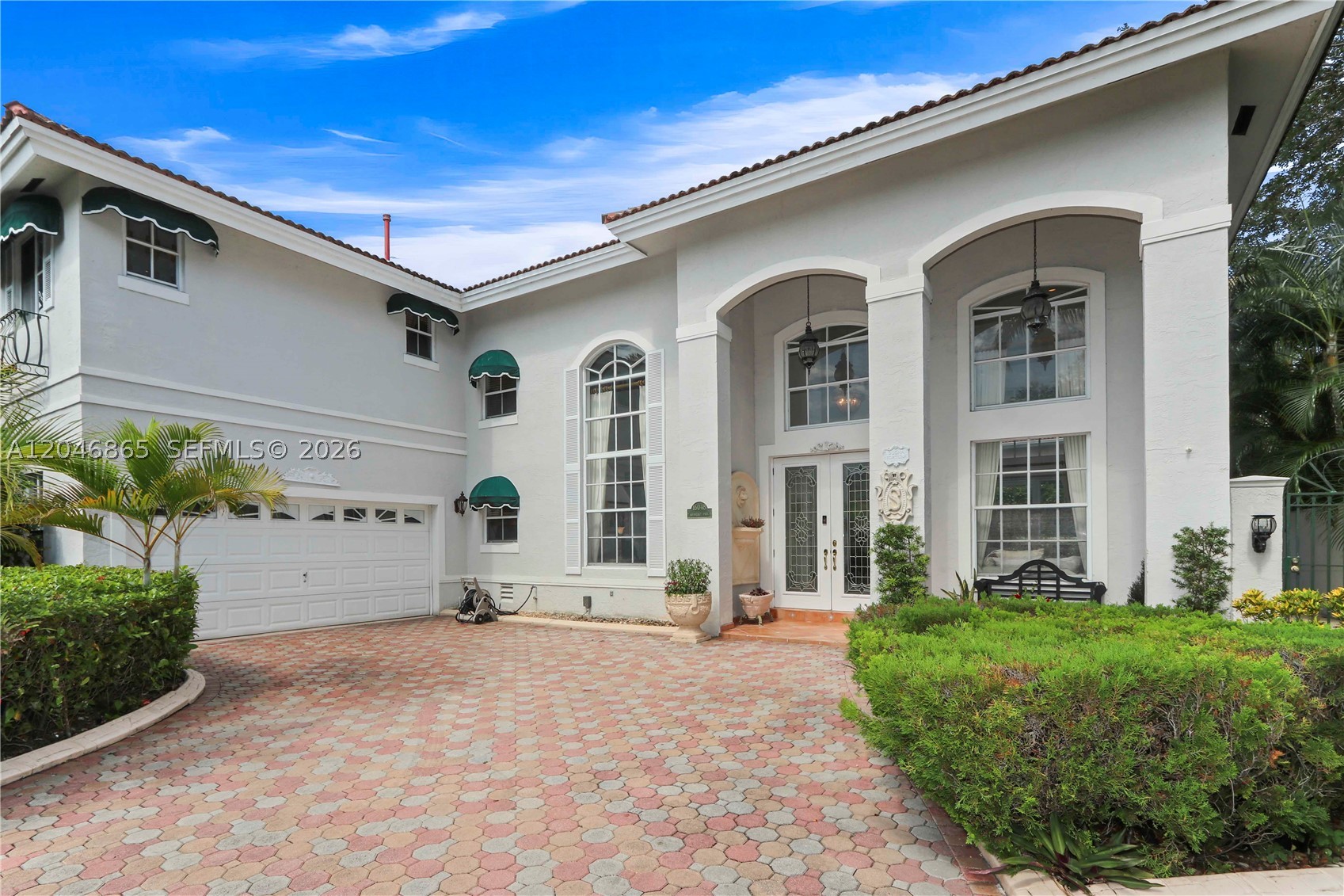 Amazing residence in the prestigious and highly desirable Gramercy Park community in Miami Lakes! Lovingly maintained by its original owner, this beautiful corner home showcases true pride of ownership.

A spacious paver driveway leads to the two-car garage and impressive front porch with soaring ceilings. Step inside to an open and inviting floor plan featuring expansive living areas, dramatic high ceilings, and beautiful views of the sparkling pool, creating the perfect space for both everyday living and entertaining.

This home offers 5 spacious bedrooms and 3 full bathrooms, including one bedroom and one full bath conveniently located on the first floor—ideal for guests or multi-generational living.

Ideally located with easy access to Miami International Airport, Fort Lauderdale-Hollywood International Airport, I-75, SR 826, I-95, and the Florida Turnpike, making commuting throughout South Florida a breeze.

Gramercy Park is a gated community with 24-hour guard security, offering residents peace of mind in one of Miami Lakes' most sought-after neighborhoods.

All buyers must call to schedule an appointment.
