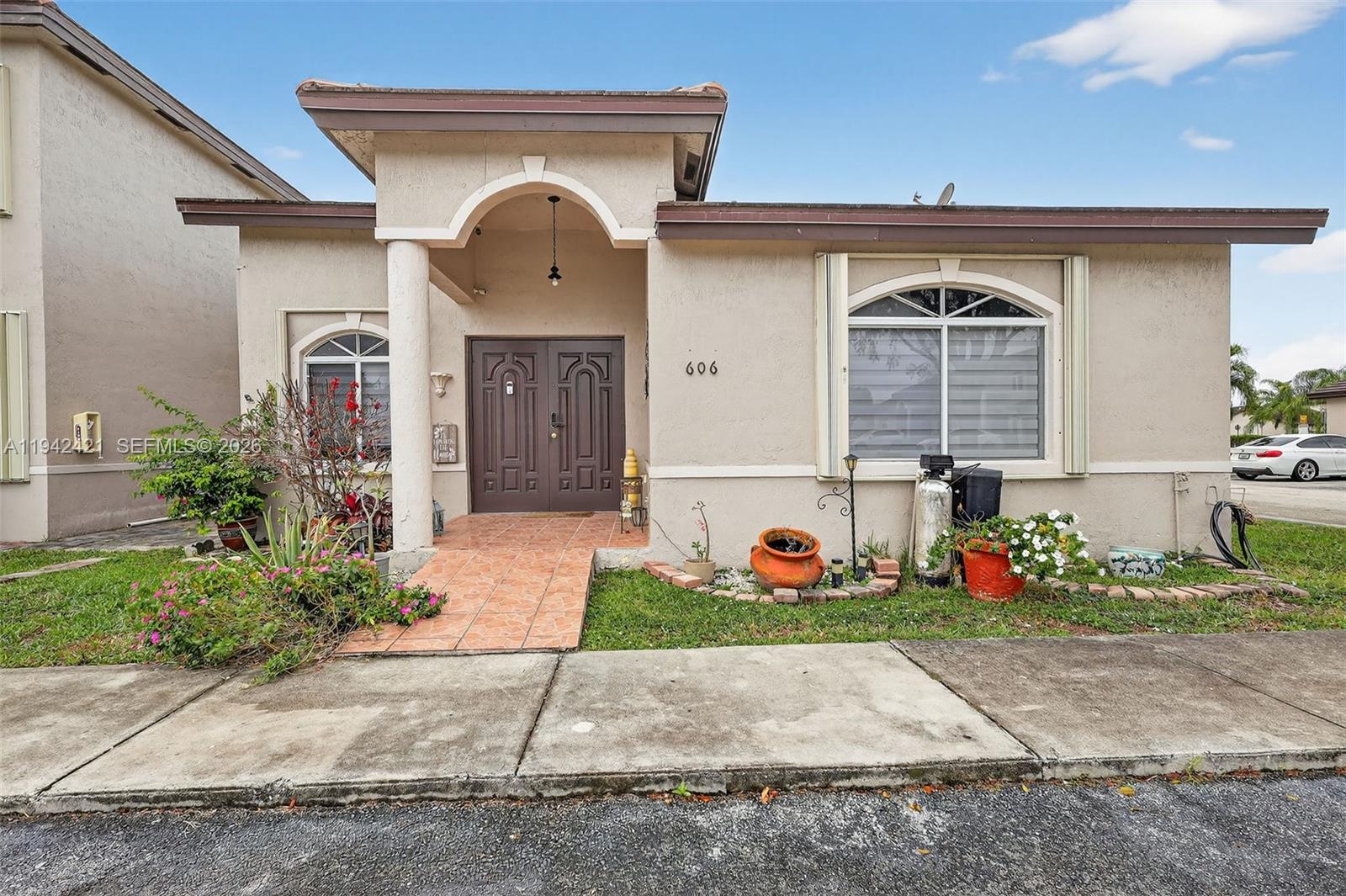 Welcome to this beautifully maintained corner villa residence offering comfort, style, and functionality. This inviting home features an open-concept living and dining area with soaring vaulted ceilings and durable wood-look flooring throughout, creating a bright and spacious feel.
The updated kitchen showcases modern cabinetry, stainless steel appliances, sleek countertops, and ample storage, with direct access to a private, fenced patio with extra storage! Perfect for outdoor dining, entertaining, or relaxing. Natural light fills the interior through large windows with custom blinds, enhancing the home’s warm and neutral color palette.
The spacious bedroom provides a peaceful retreat with generous closet space and easy access to the full bathroom. Additional highlights include a covered front entry, private outdoor areas, and convenient nearby parking.
 Easy access to major highways, shopping, dining, and everyday conveniences. A great opportunity for primary residents or investors alike.
