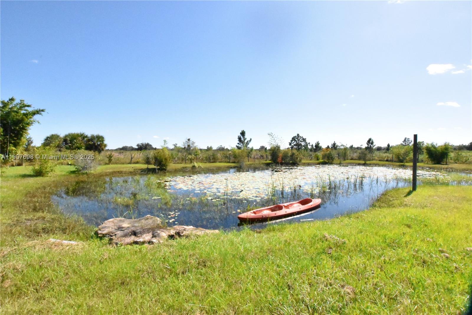 Nestled in the heart of The Prairies, this stunning 2.5-acre (two-lot) property offers the perfect blend of tranquility and opportunity. Surrounded by lush nature and local wildlife, the fully gated grounds include two picturesque lakes, a Tiki shed, elevated infill soil, and a culvert for easy access. With city power available and no wetlands, it’s ready for you to build your dream home and enjoy ample space for gardening, agriculture, or livestock.